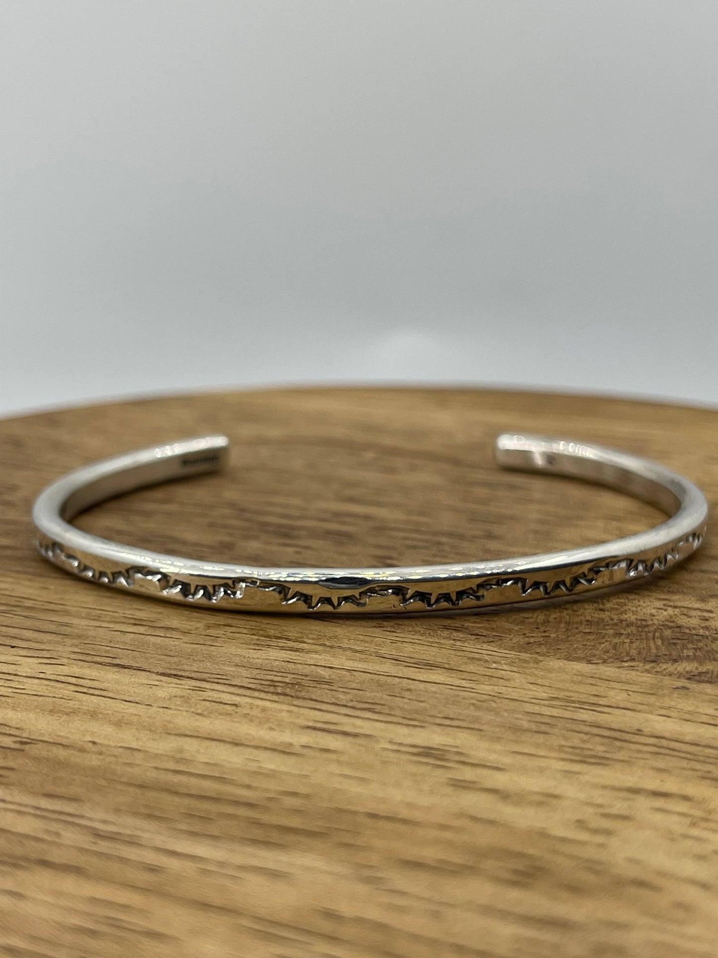 Stamped Round Wire Stacker Cuff by Elaine Tahe, Navajo (Stamping varies)