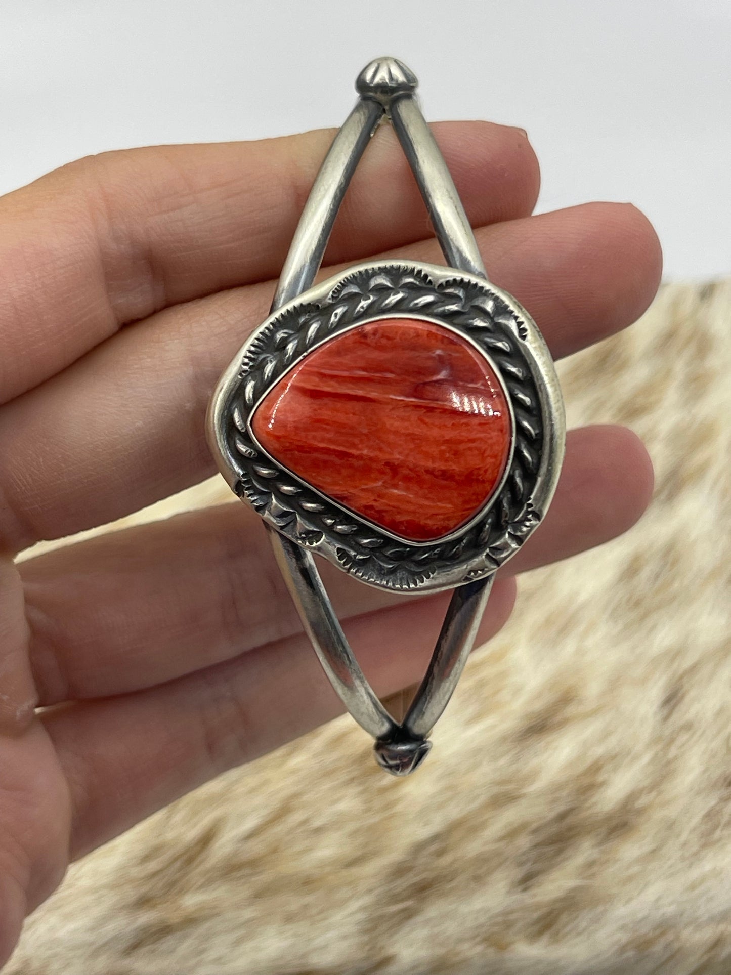 7 3/4"-7 1/4" Teardrop Orange Spiny Oyster Shell Cuff by Augustine Largo, Navajo