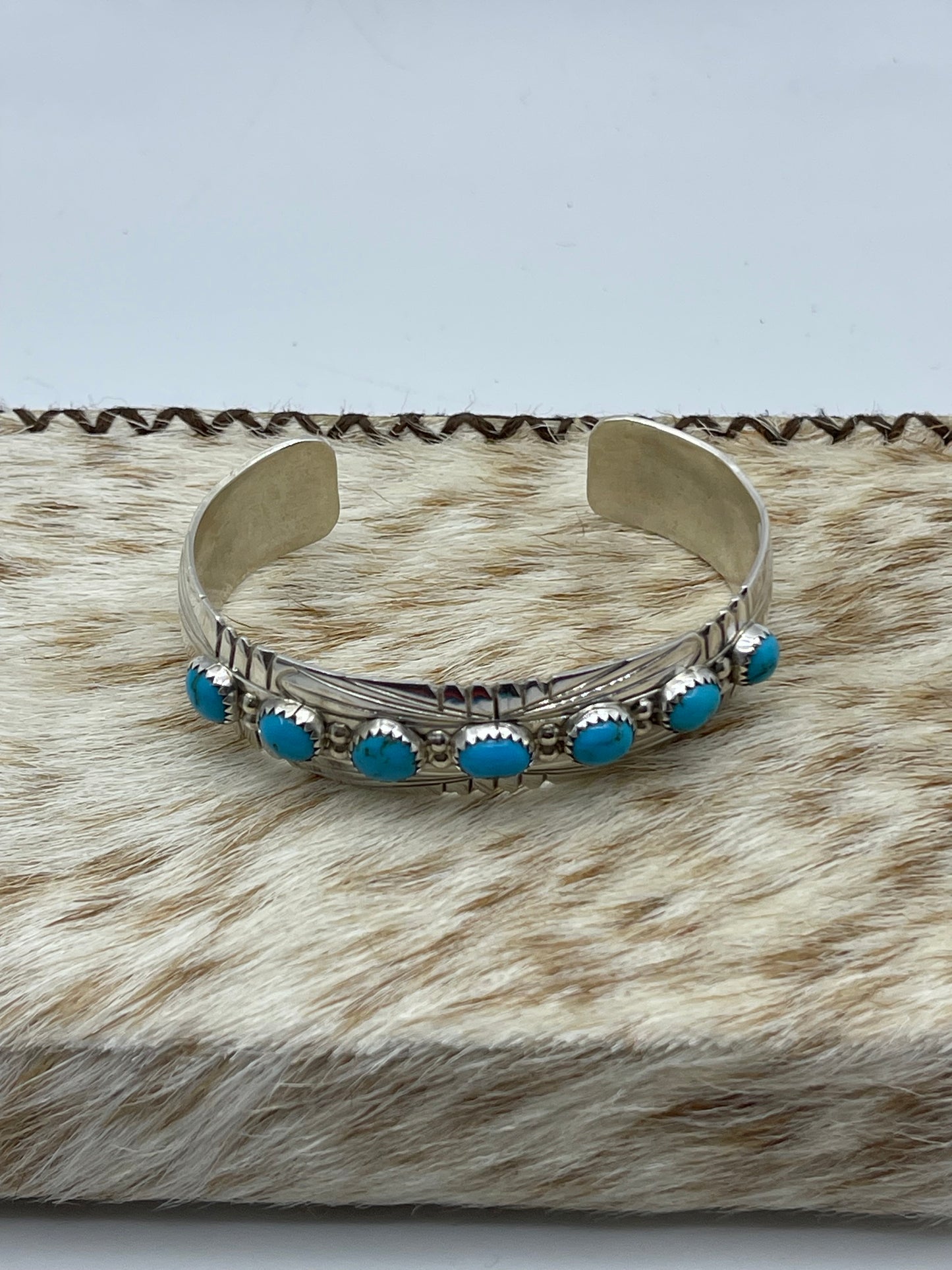 6"-6 3/4" 7 Stone Sleeping Beauty Turquoise Cuff by David Segar, Navajo