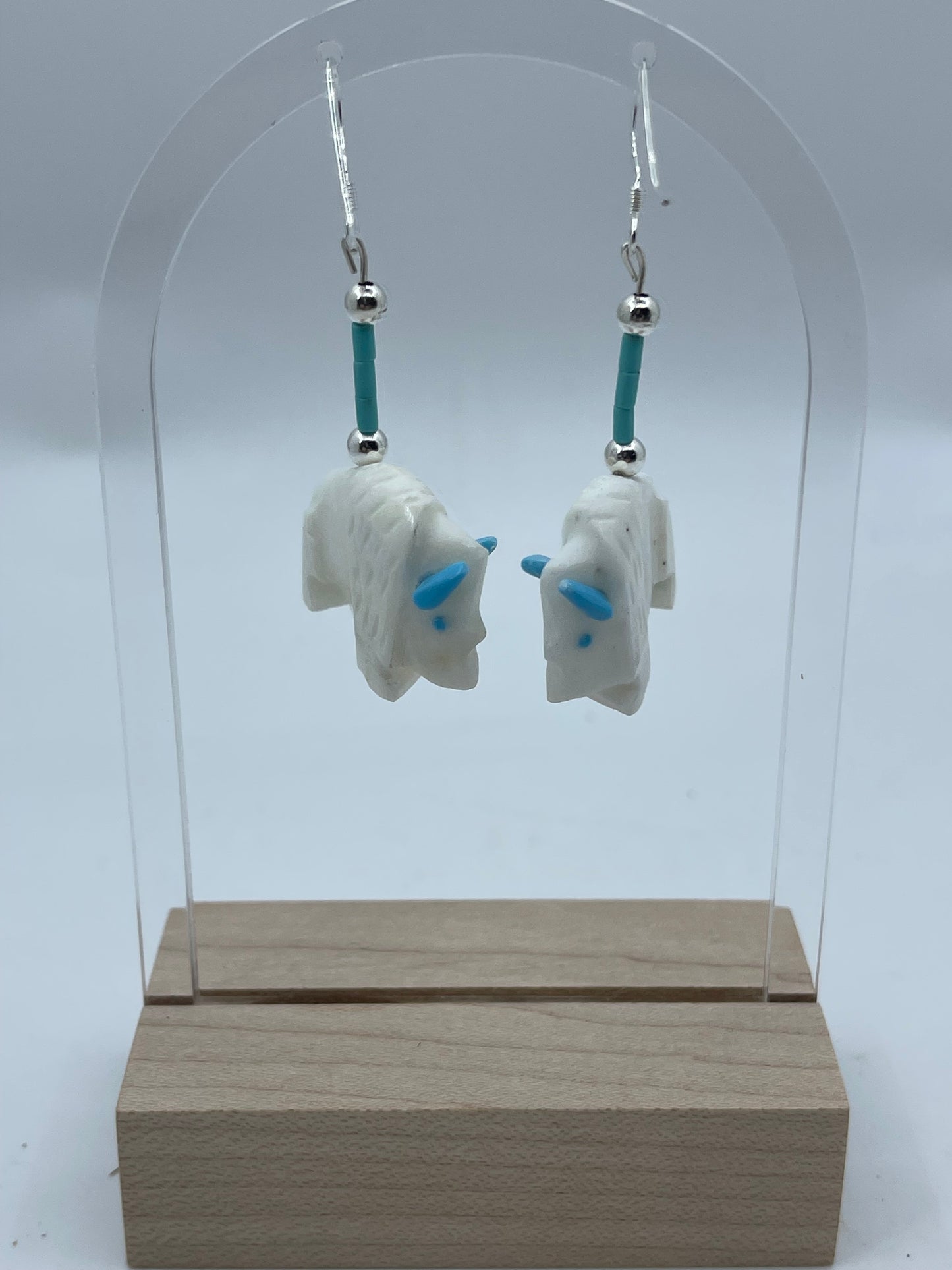 Carved Turquoise Buffalo Dangle Earrings by Todd Etsatie, Zuni