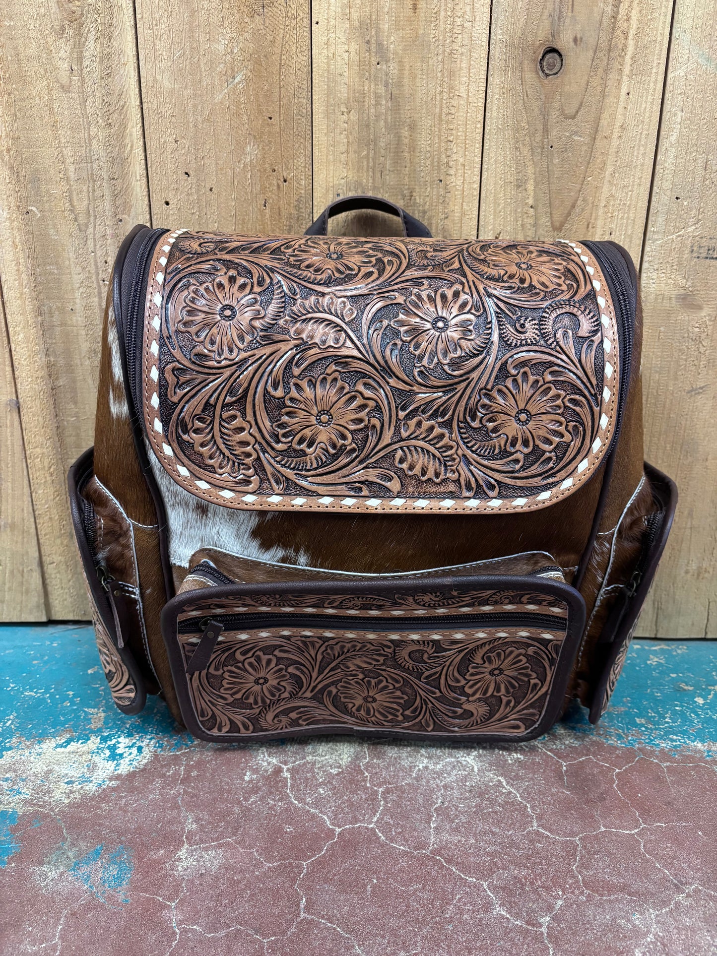 Version 1 Brown and White Cowhide Flower Tooled Leather Backpack