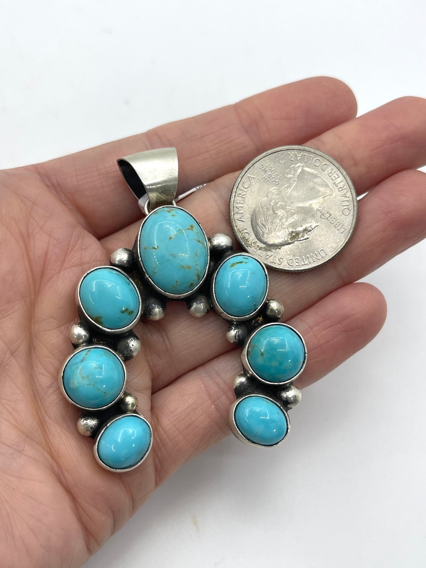 Kingman Turquoise Naja by Augustine Largo, Navajo