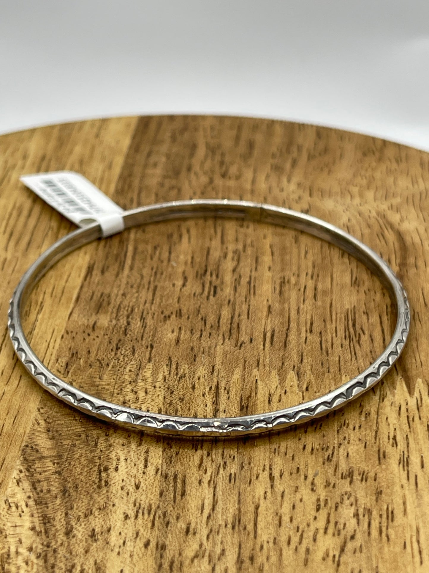 8" Stamped Triangle Wire Bangle by Elaine Tahe, Navajo