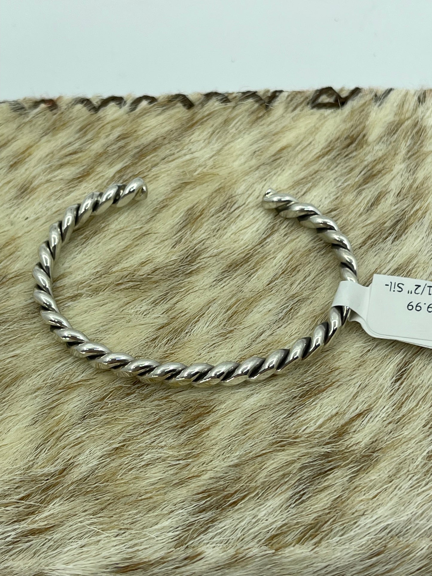 5 1/4"-6 1/2" Silver Twisted Cuff by Elaine Tahe, Navajo