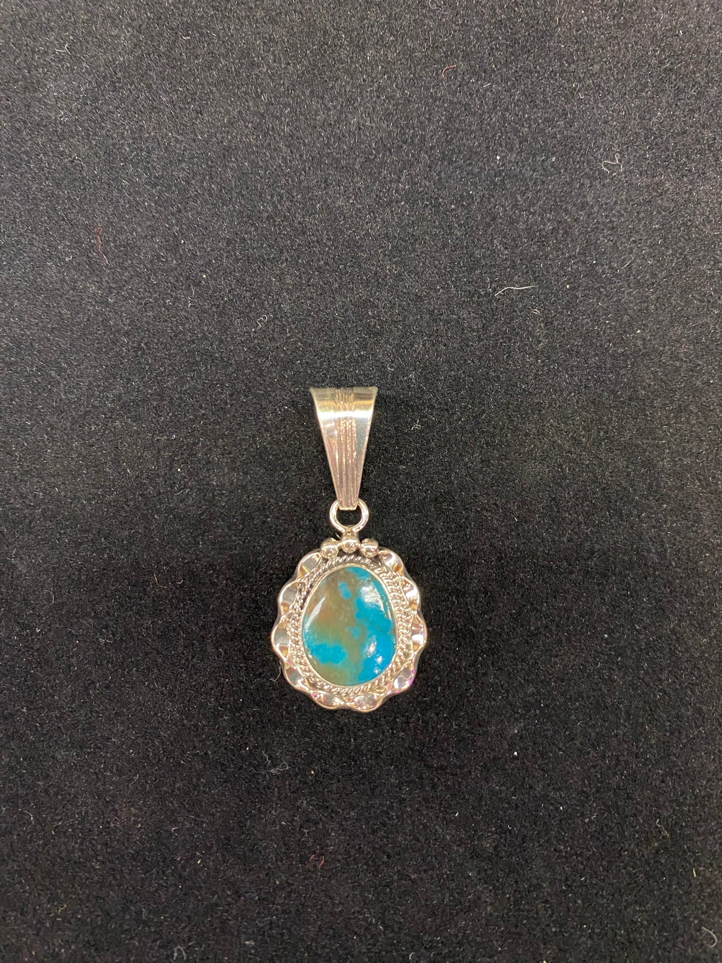 Campitos Turquoise Pendant by Samuel Yellowhair, Navajo