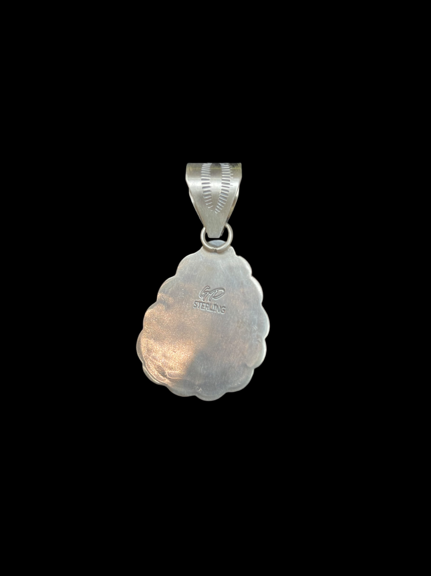 Sugilite Pendant by Gilbert Platero, Navajo