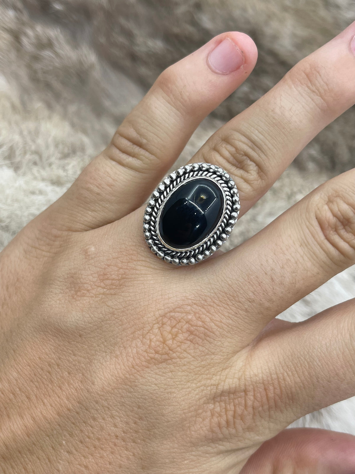 7.5 Black Onyx Oval Ring with Silver Border