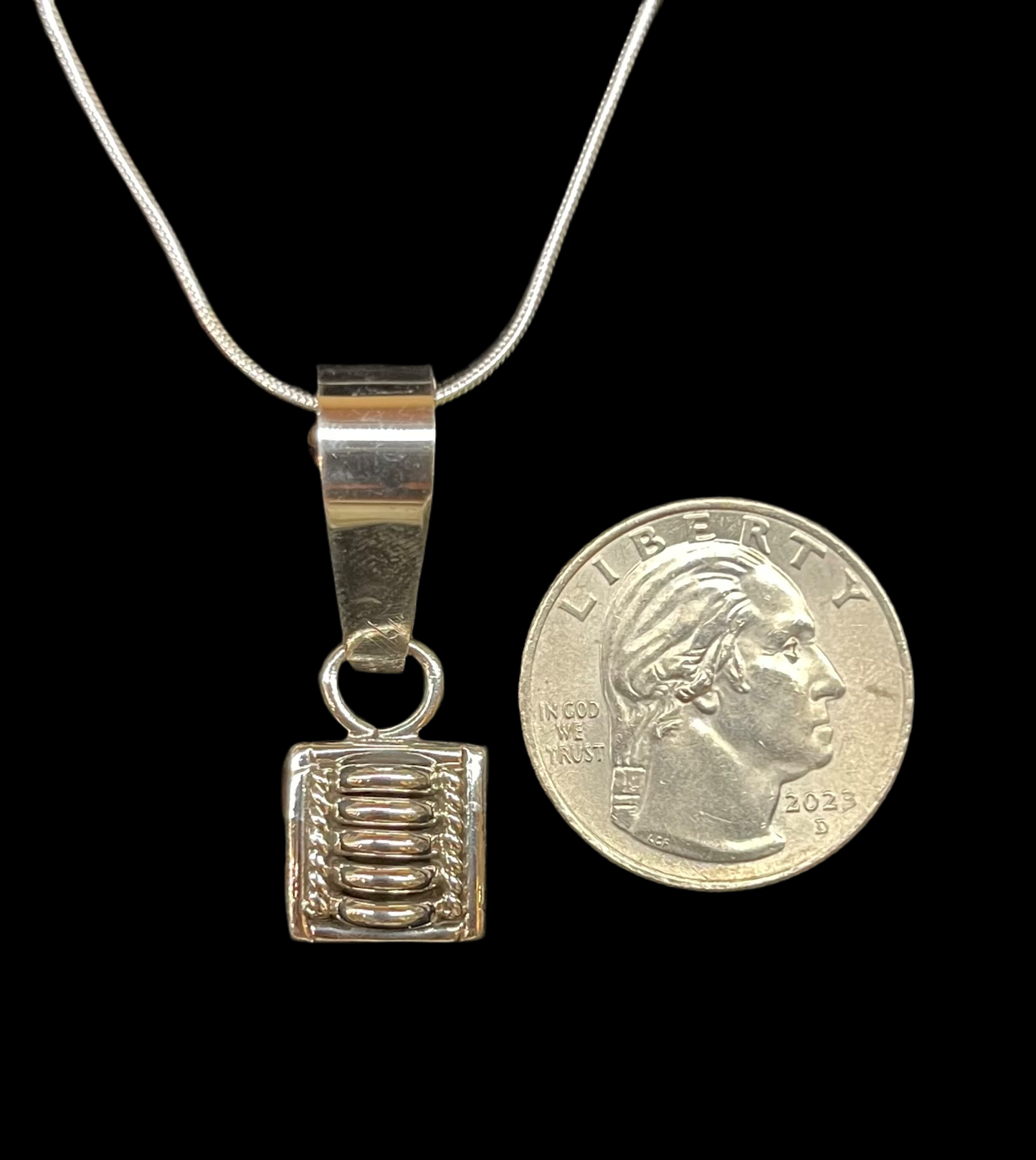 Sterling Silver Pendant by Thomas Charley, Navajo