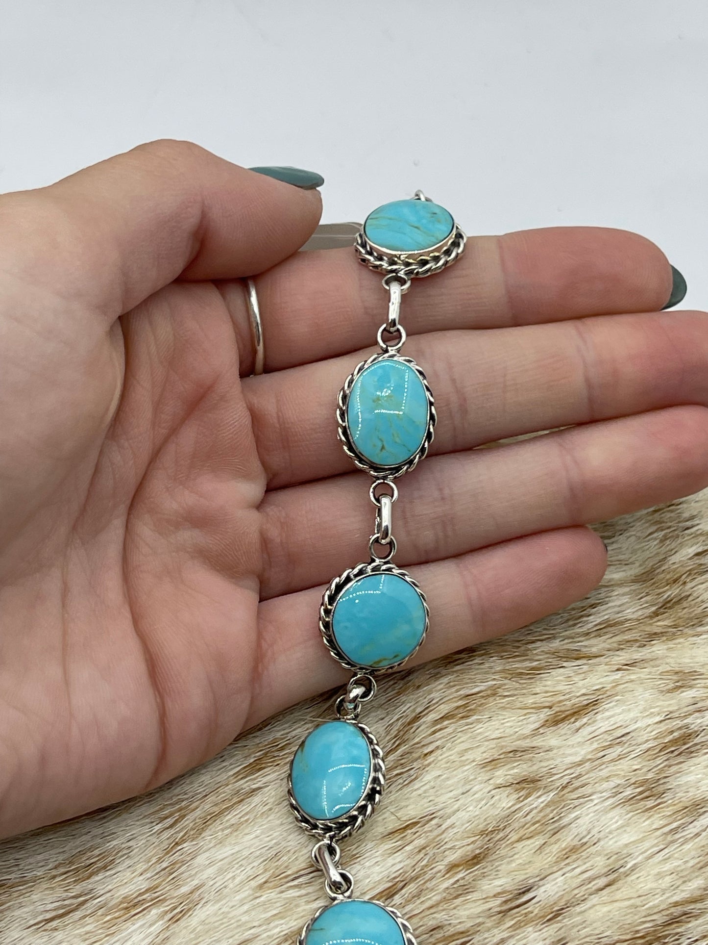 7 1/2"-9 1/2" 7 Stone Turquoise Linked Bracelet by Arlene Lewis, Navajo