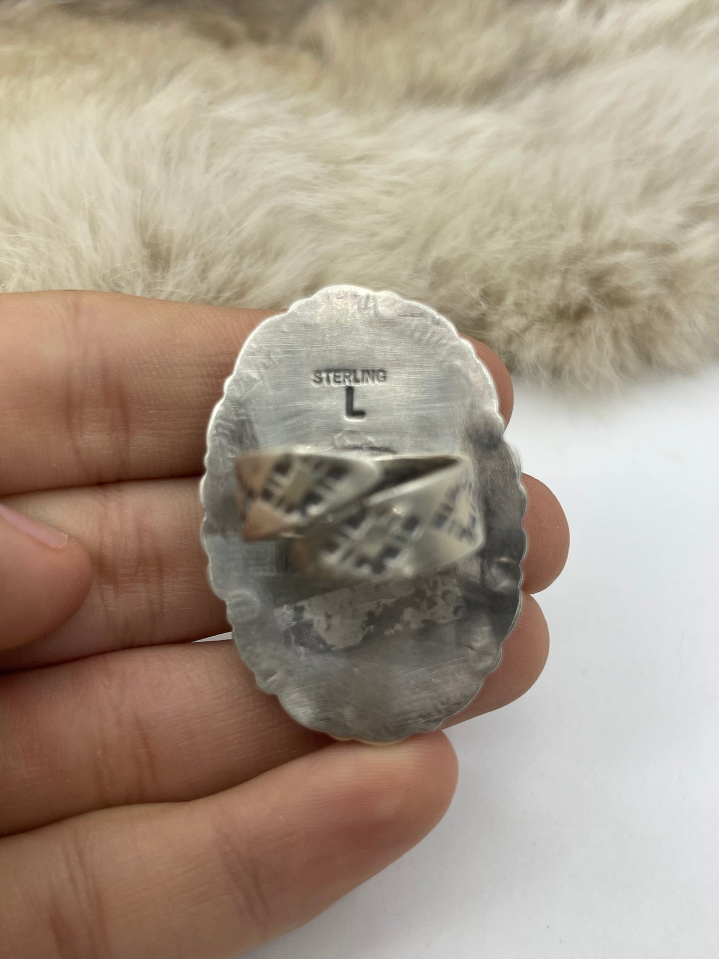 LOT 24 C 9/6 Adjustable 7.0-10.0 White Buffalo Ring with Stamped "L" by Artist