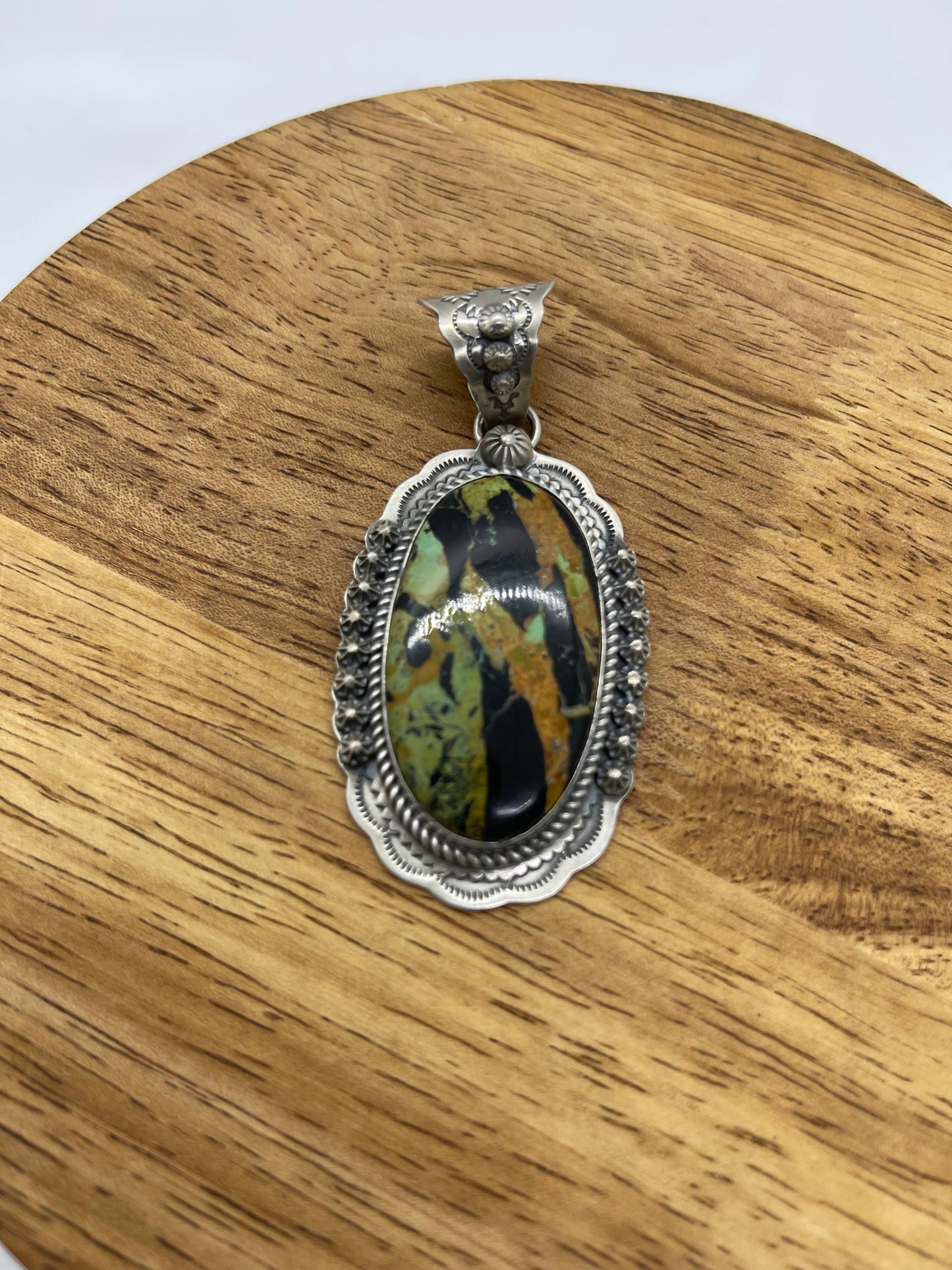 Black Jack Turquoise Oval Pendant with a 11.5mm Bale by Gilbert Platero, Navajo