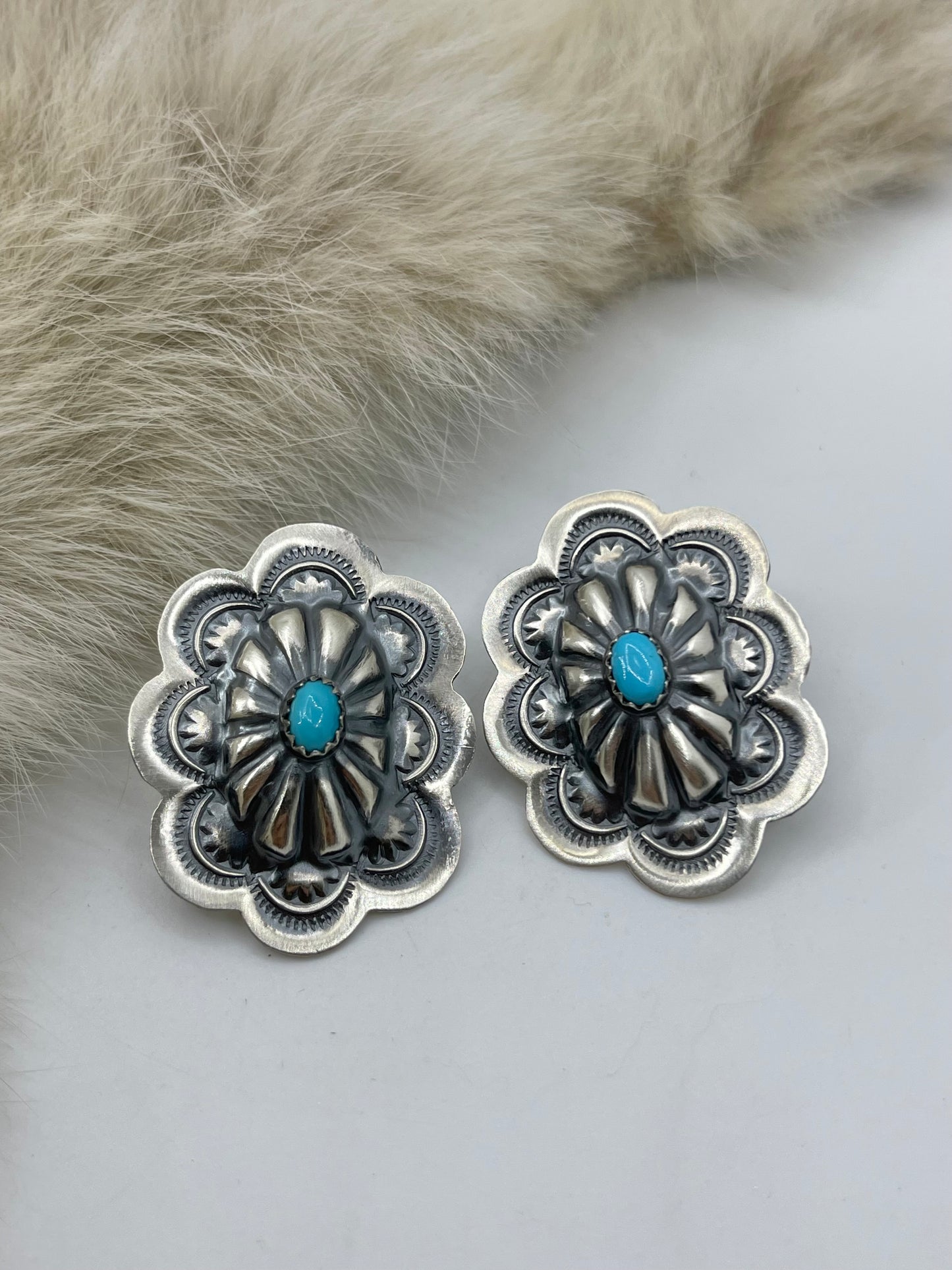 Stamped Oval Concho Earrings by Lavina Benally, Navajo