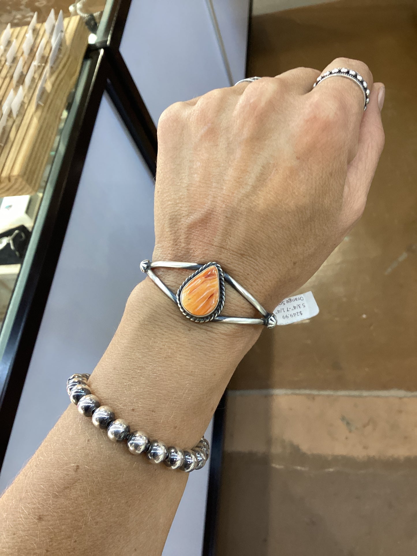 5.75" - 7.25 " Orange Spiny Oyster Shell Teardrop Cuff by Augustine Largo, Navajo