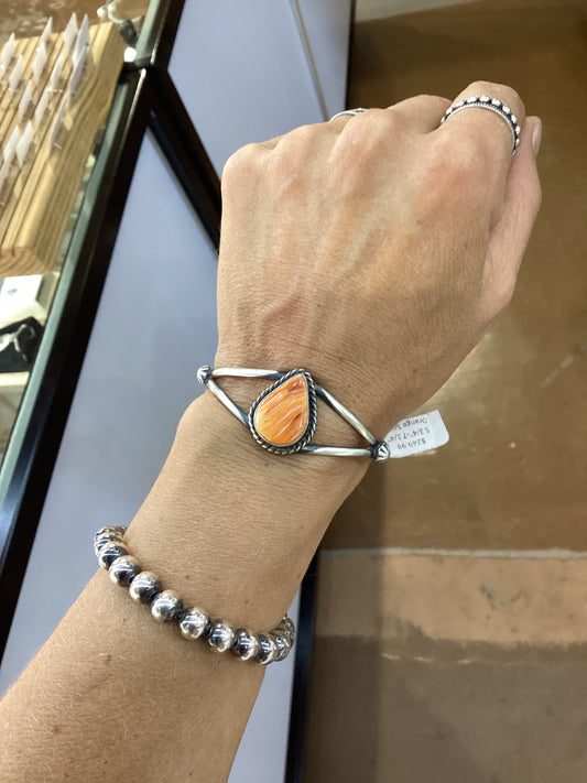 5.75" - 7.25 " Orange Spiny Oyster Shell Teardrop Cuff by Augustine Largo, Navajo