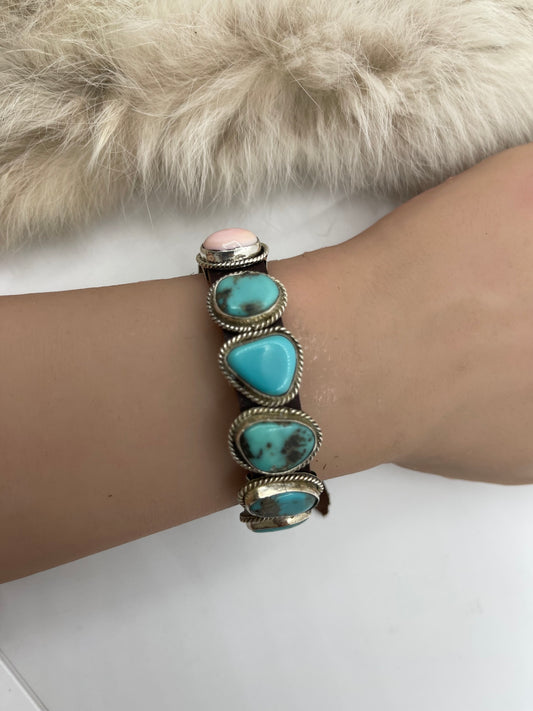 Kingman Turquoise and Pink Conch Shell on Leather by Daniel Morgan, Navajo