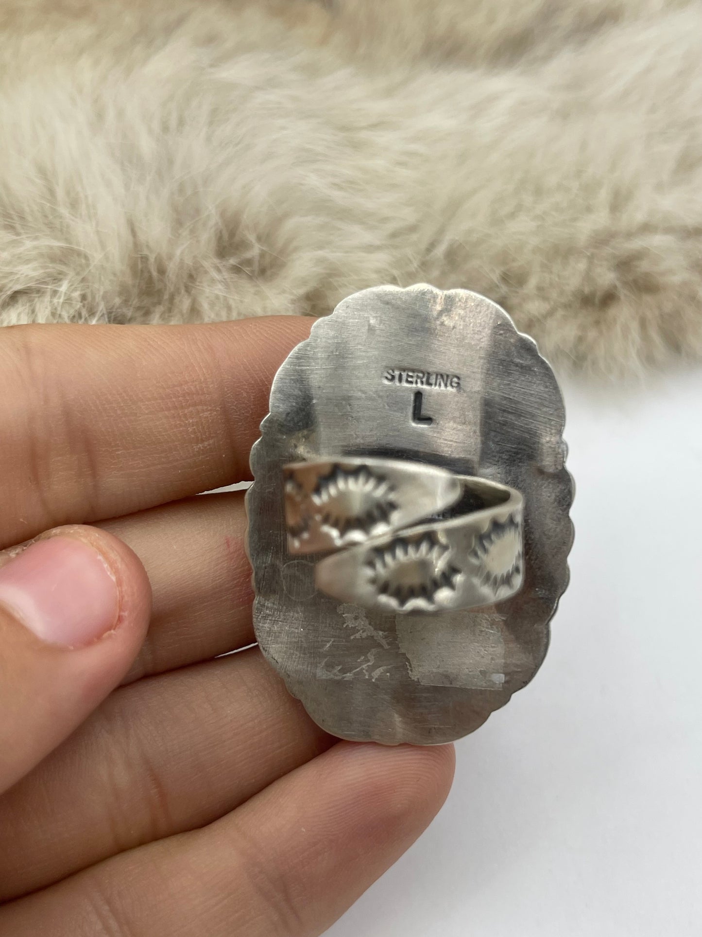 Adjustable 7.0-10.0 White Buffalo Ring with Stamped "L" by Artist