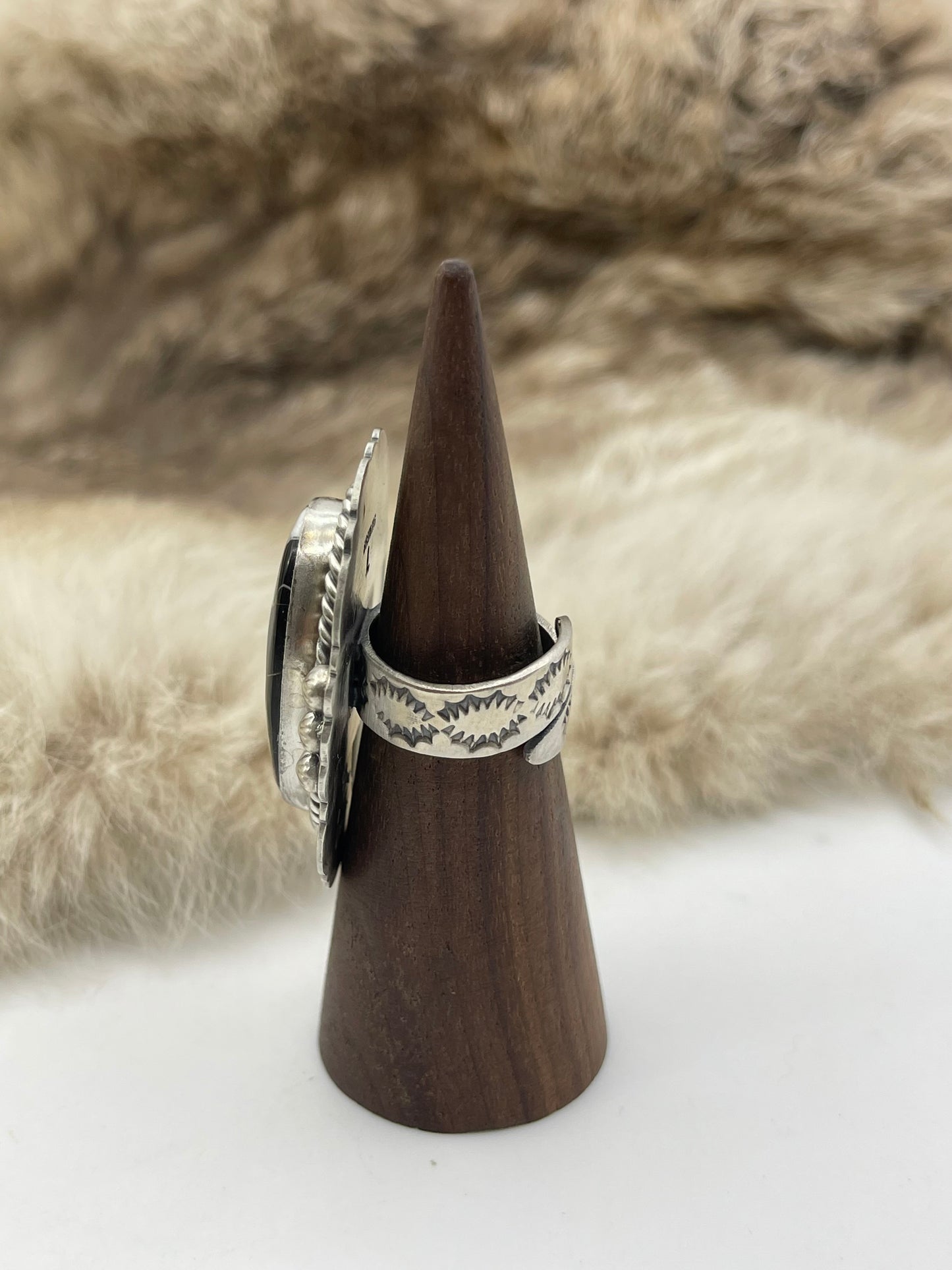 Adjustable 7.0-10.0 White Buffalo Ring with Stamped "L" by Artist