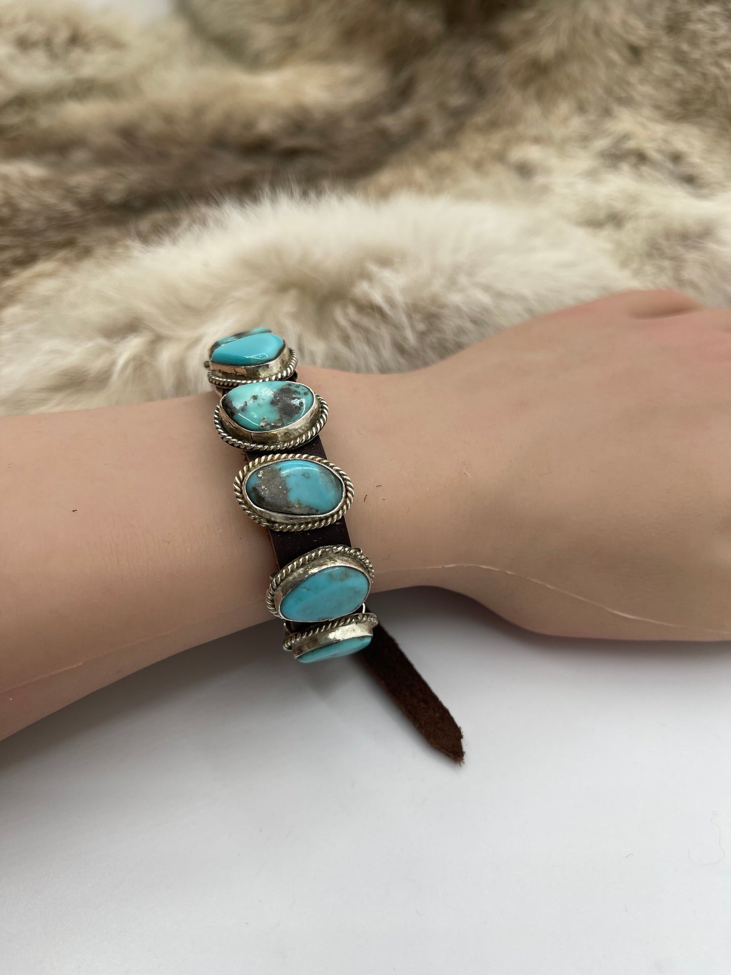 Kingman Turquoise and Pink Conch Shell on Leather by Daniel Morgan, Navajo