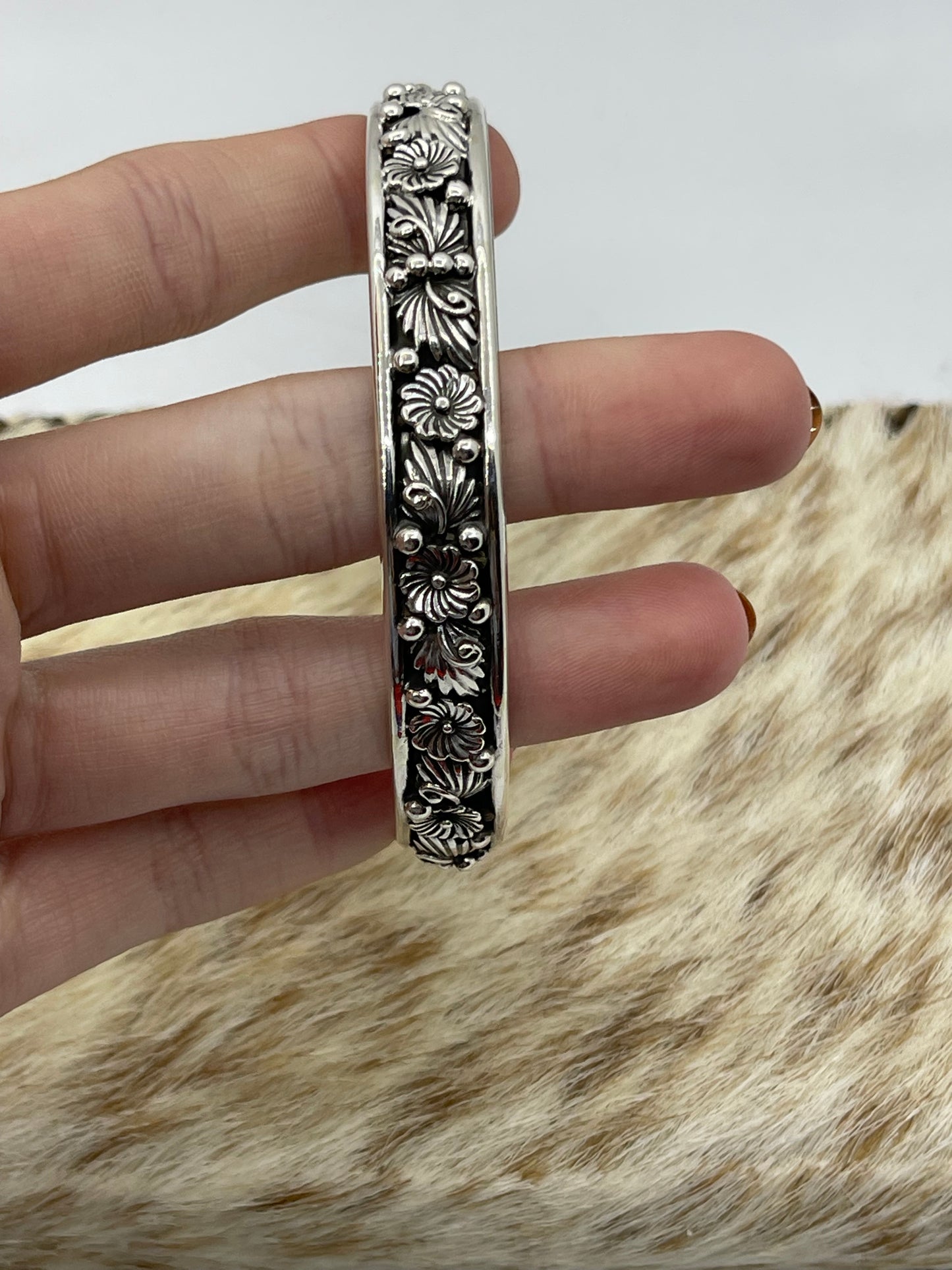 8 1/4" Silver Floral Bangle by Sadie Jim, Navajo