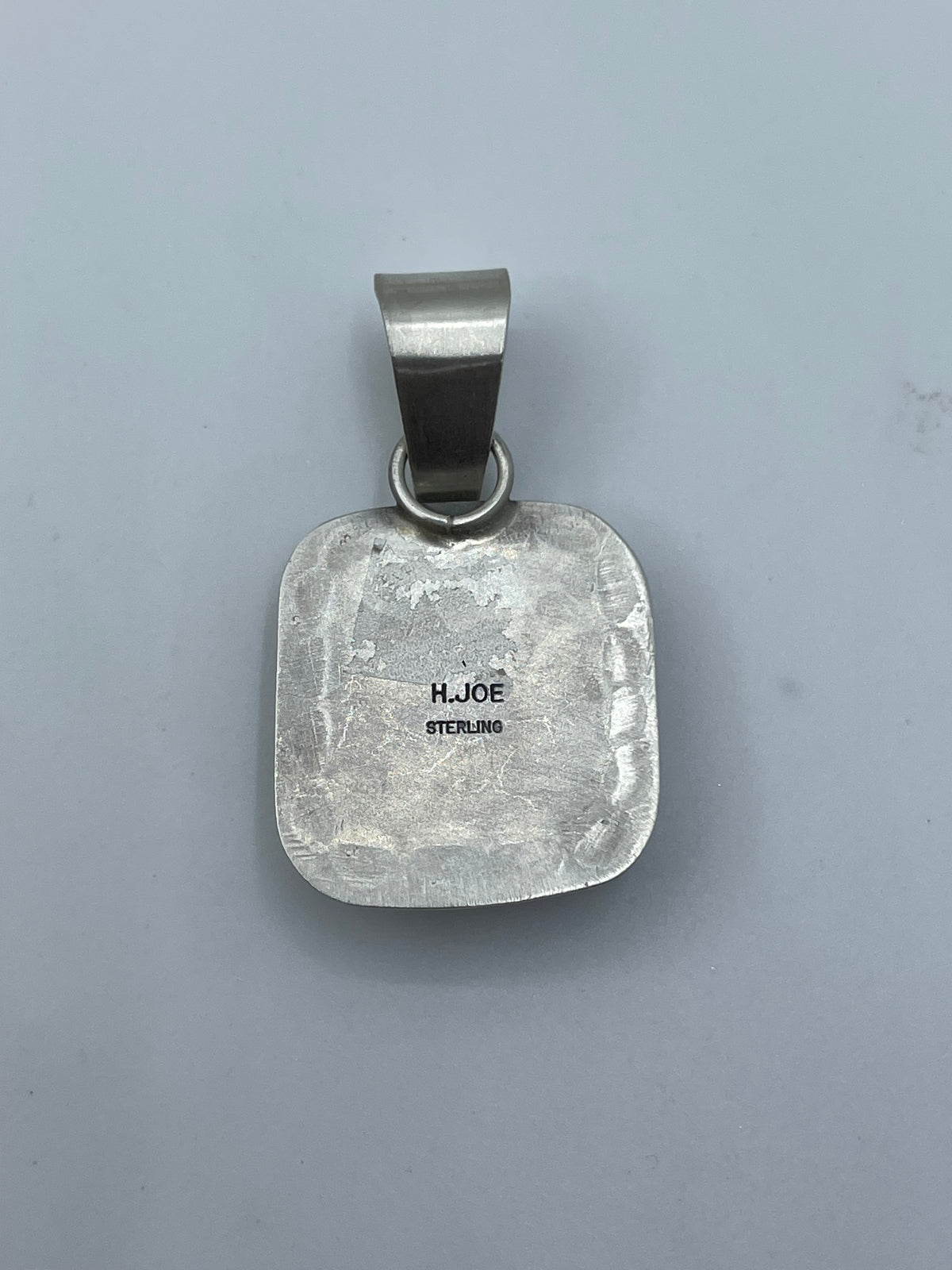 LOT 84 A 9/20 Blackjack Turquoise Pendant by Harold Joe, Navajo