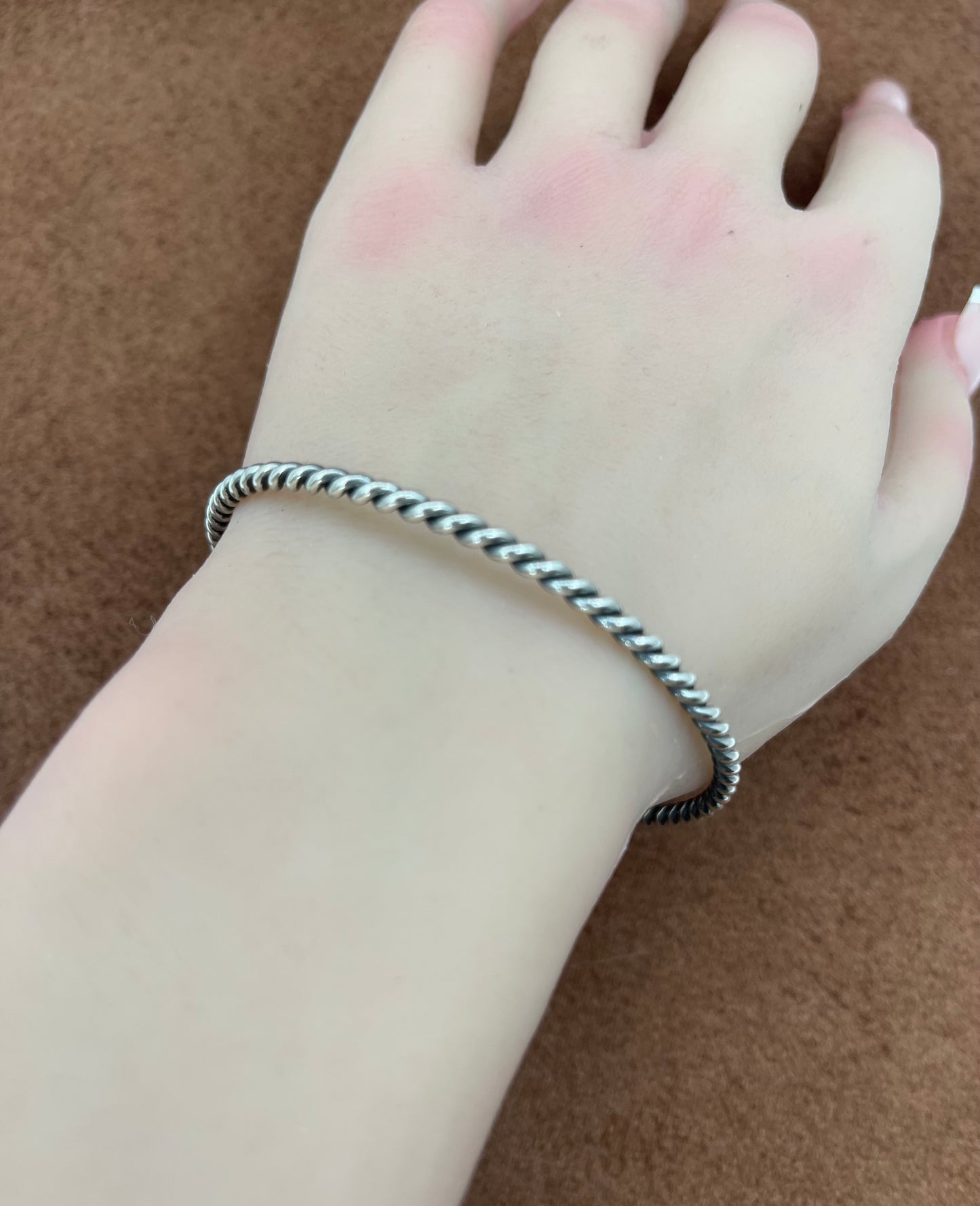 8 1/4" Twisted Silver Bangle by Elaine Tahe, Navajo