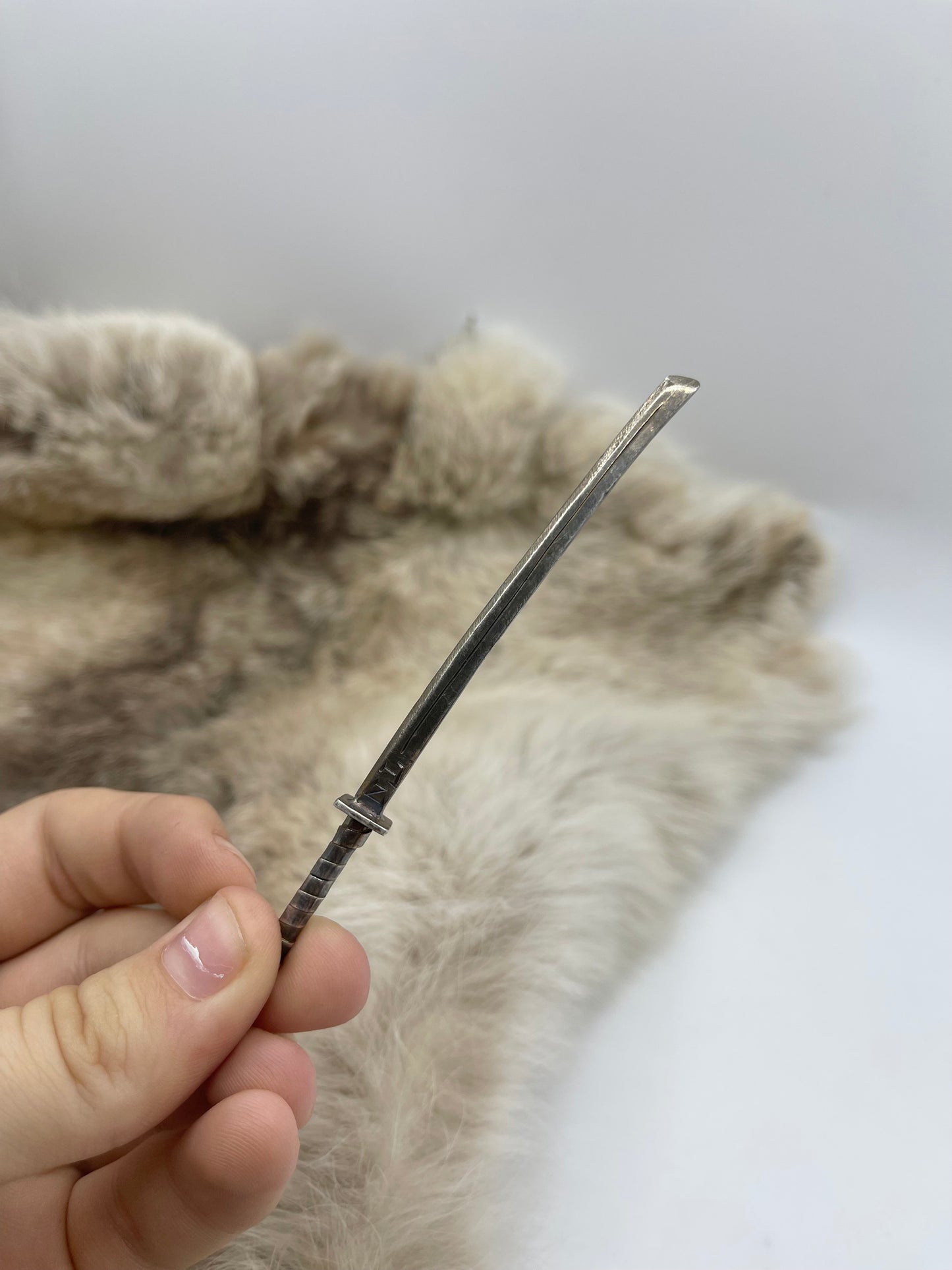 Sterling Sword Hat Toothpick by Bad Bronc