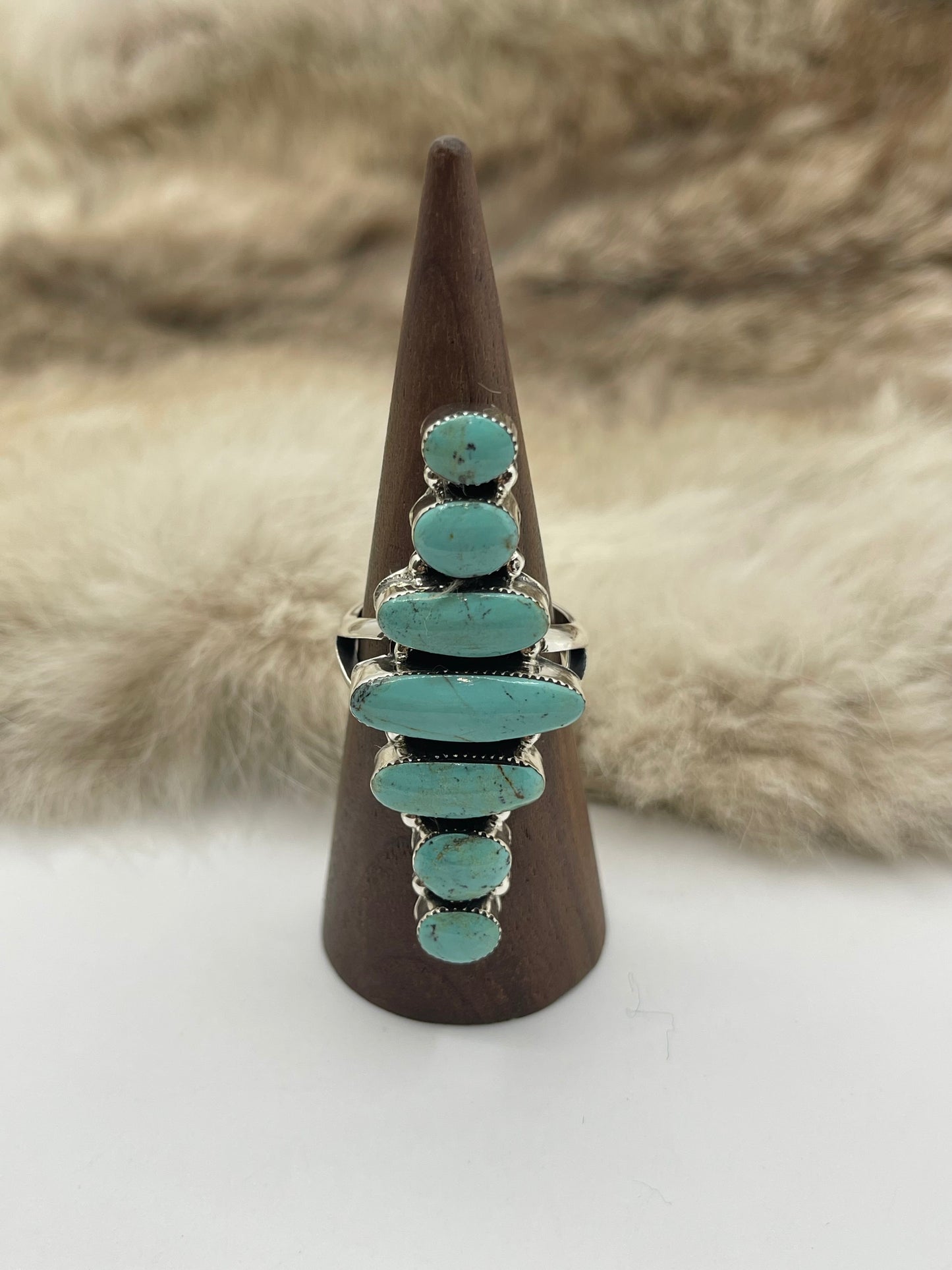 10.0 7 Stone Turquoise Ring by Loretta Delgarito, Navajo