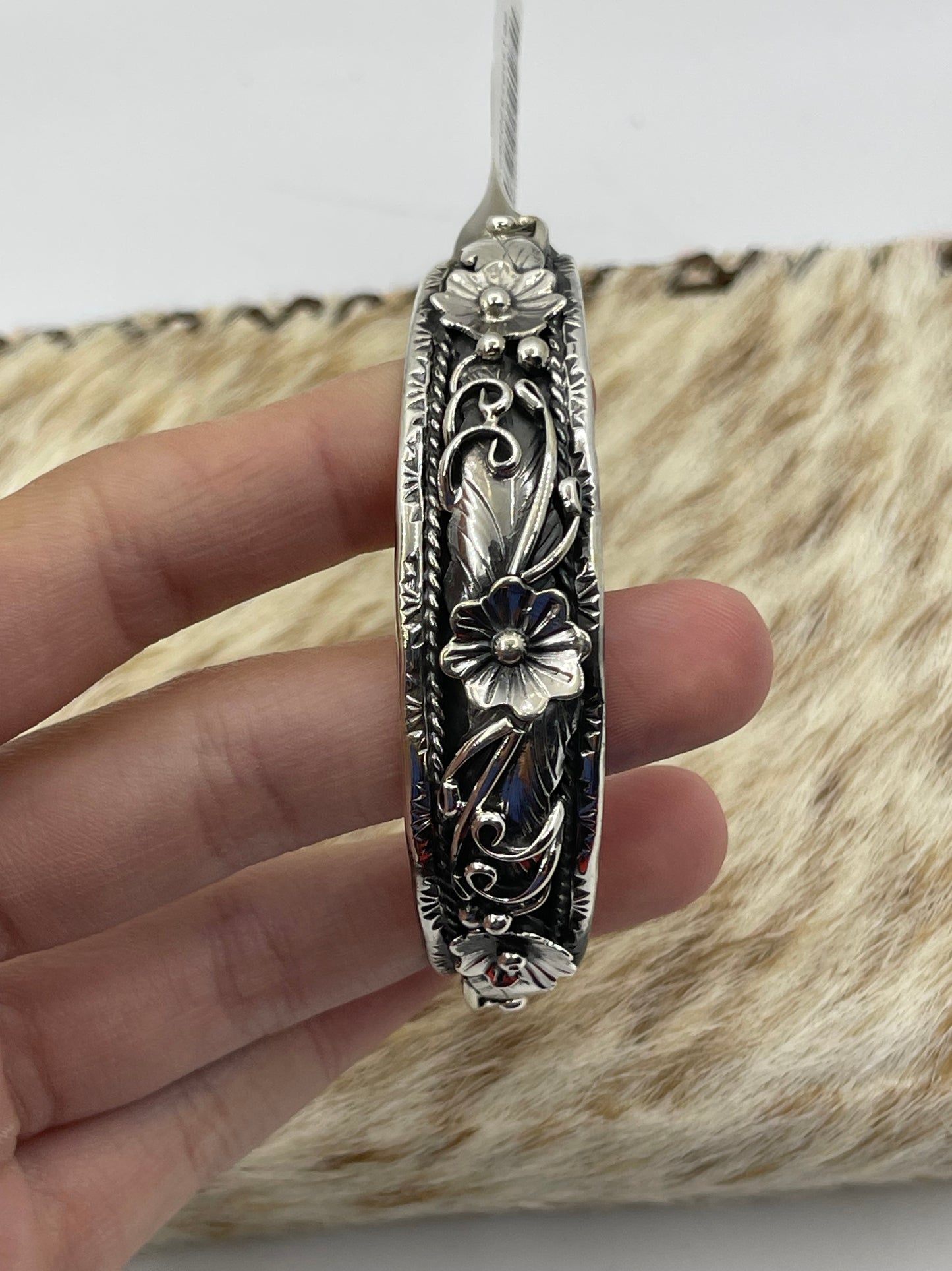 5 3/4"-7" Sterling Silver Floral Cuff by Bessie Joe, Navajo