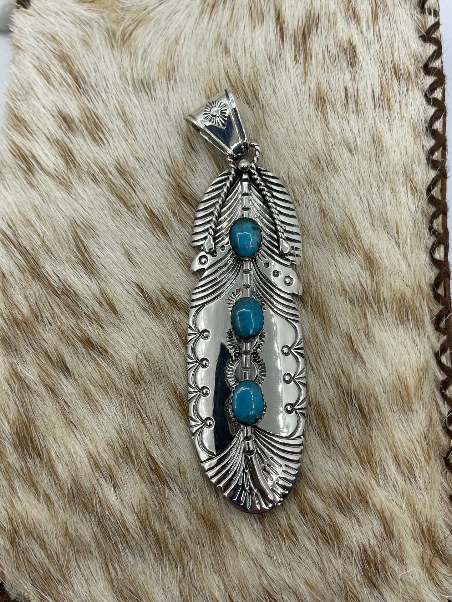 Stamped Feather Pendant with 3 Turquoise Stones