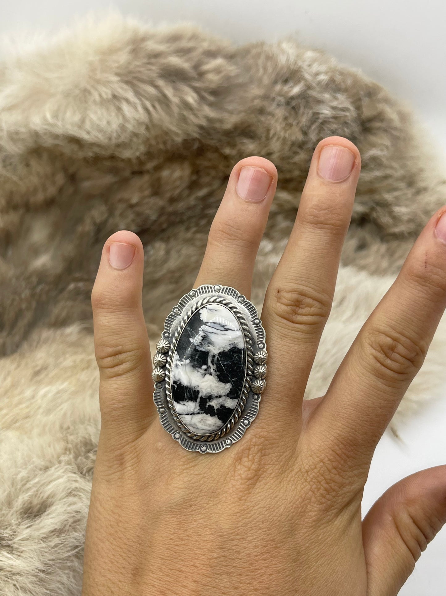 Adjustable 7.0-10.0 White Buffalo Ring with Stamped "L" by Artist