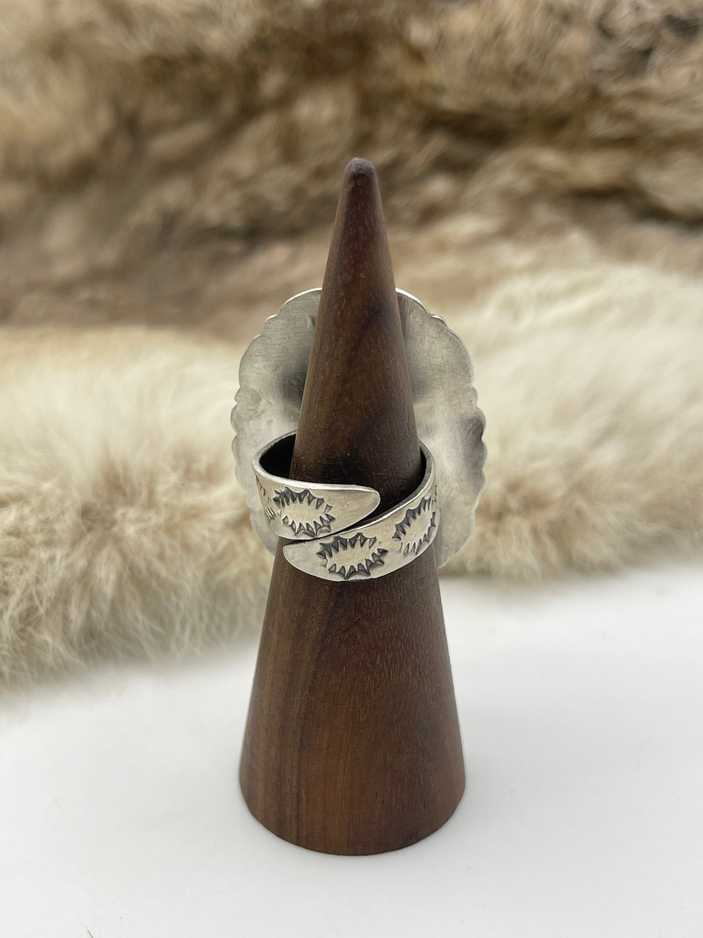 Adjustable 7.0-10.0 White Buffalo Ring with Stamped "L" by Artist