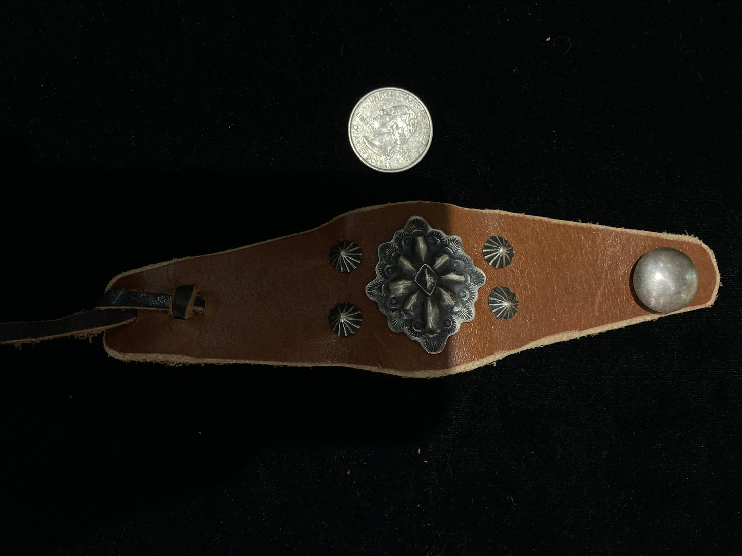 5 1/2"-8 1/2" Leather Bracelet with Sterling Silver Conchos by Danny Martinez, Navajo