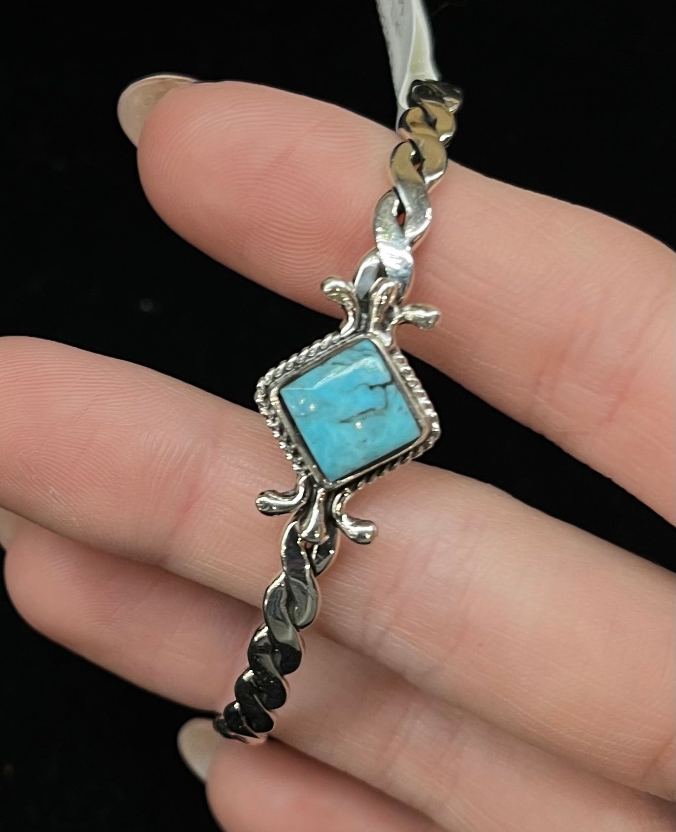 6"-7 1/4" Turquoise Diamond Shaped Twisted Cuff by Mike Smith, Navajo