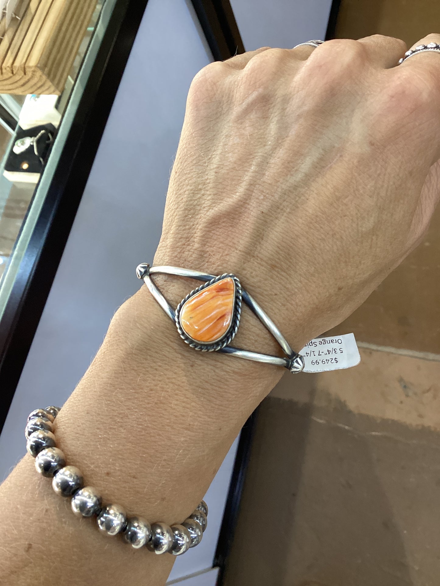 5.75" - 7.25 " Orange Spiny Oyster Shell Teardrop Cuff by Augustine Largo, Navajo