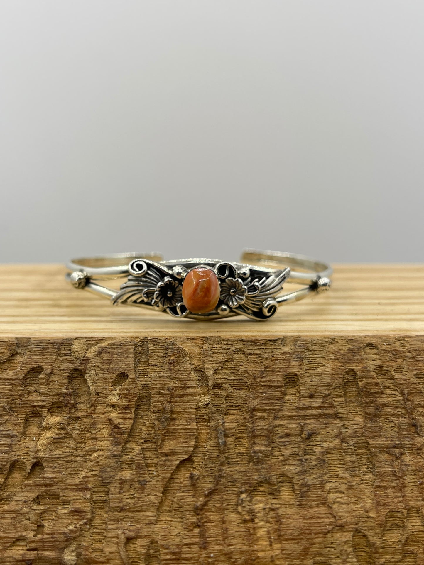 Orange Spiney Flower Cuff "6-6 1/2"