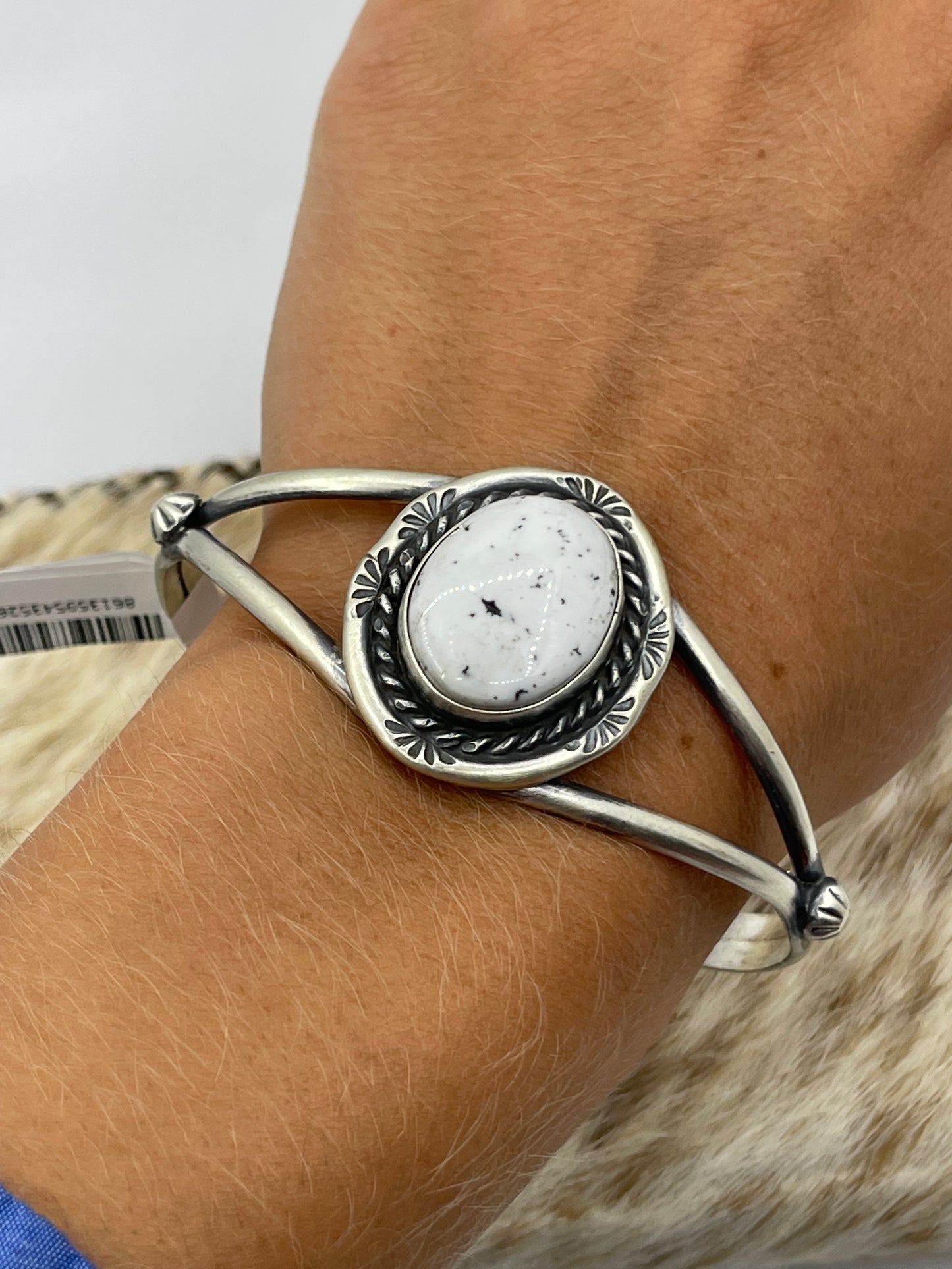 5 3/4"-7 1/4" White Buffalo Oval Cuff by Augustine Largo, Navajo