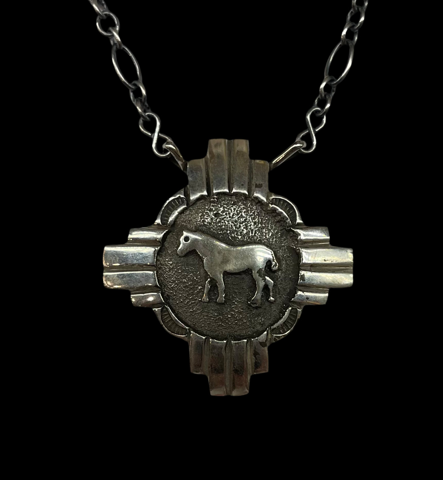 Sterling Silver Zia Symbol With Horse by Emerson Kinsel, Navajo