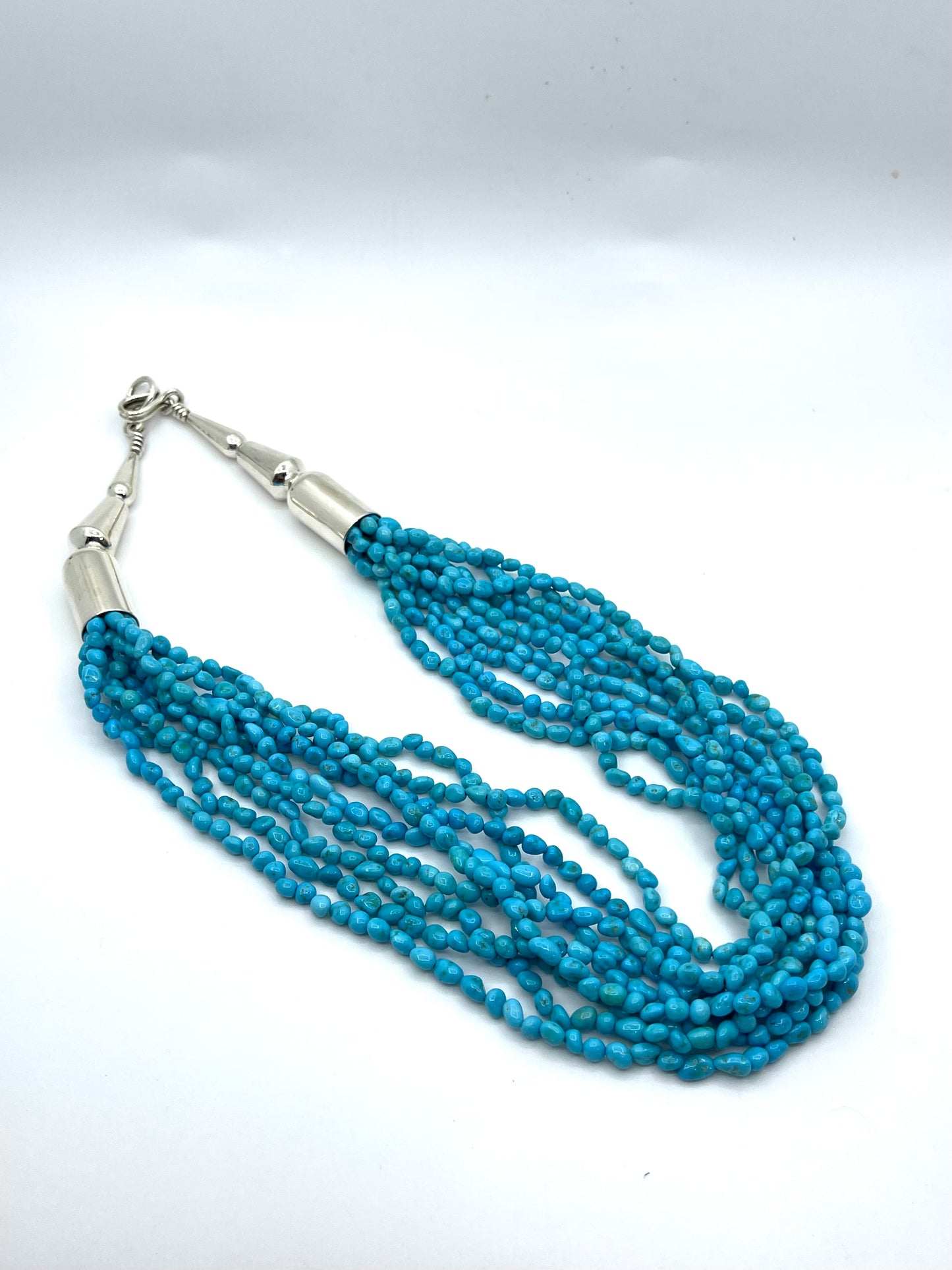 25” 9 Strand Sleeping Beauty Nugget Turquoise by Marie Jackson, Navajo