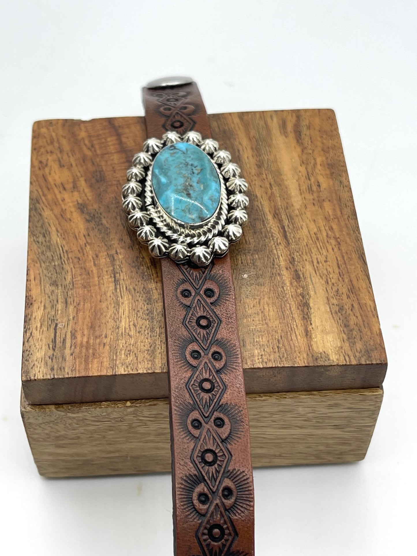 Kingman Turquoise On Stamped Leather by Suzanna Johnson, Navajo