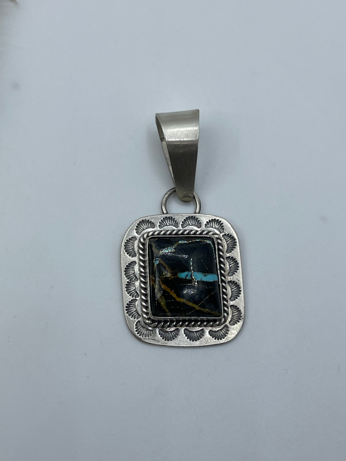 LOT 84 A 9/20 Blackjack Turquoise Pendant by Harold Joe, Navajo