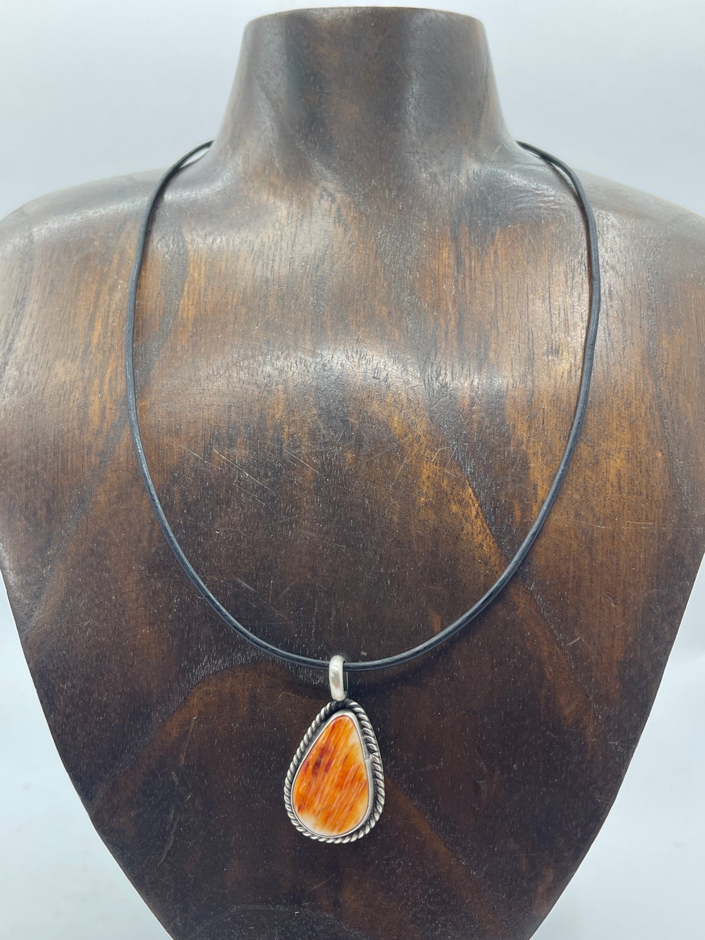 Orange Spiny Oyster Necklace On A Black Leather Cord by Johnny Dixon, Navajo