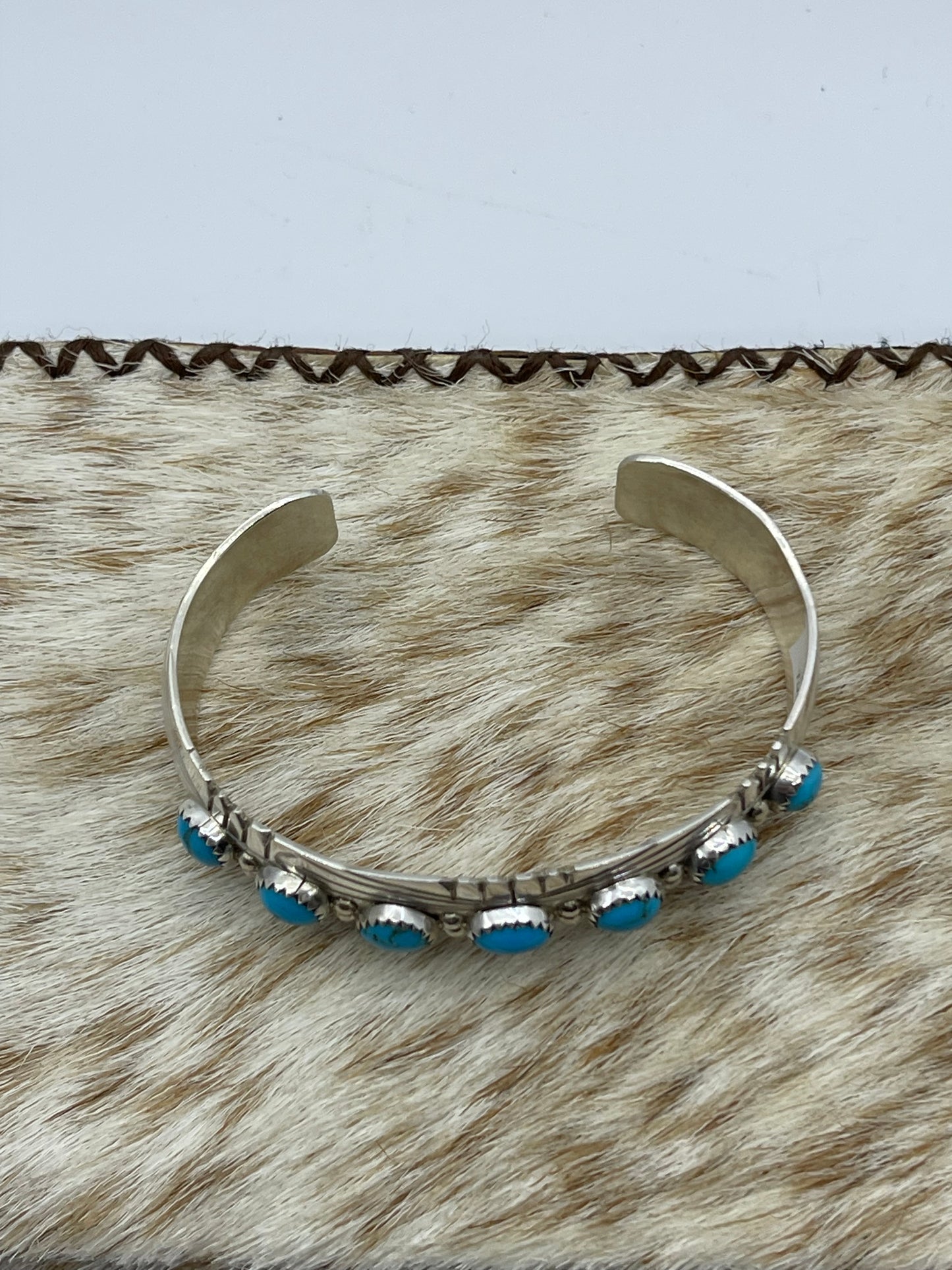 6"-6 3/4" 7 Stone Sleeping Beauty Turquoise Cuff by David Segar, Navajo