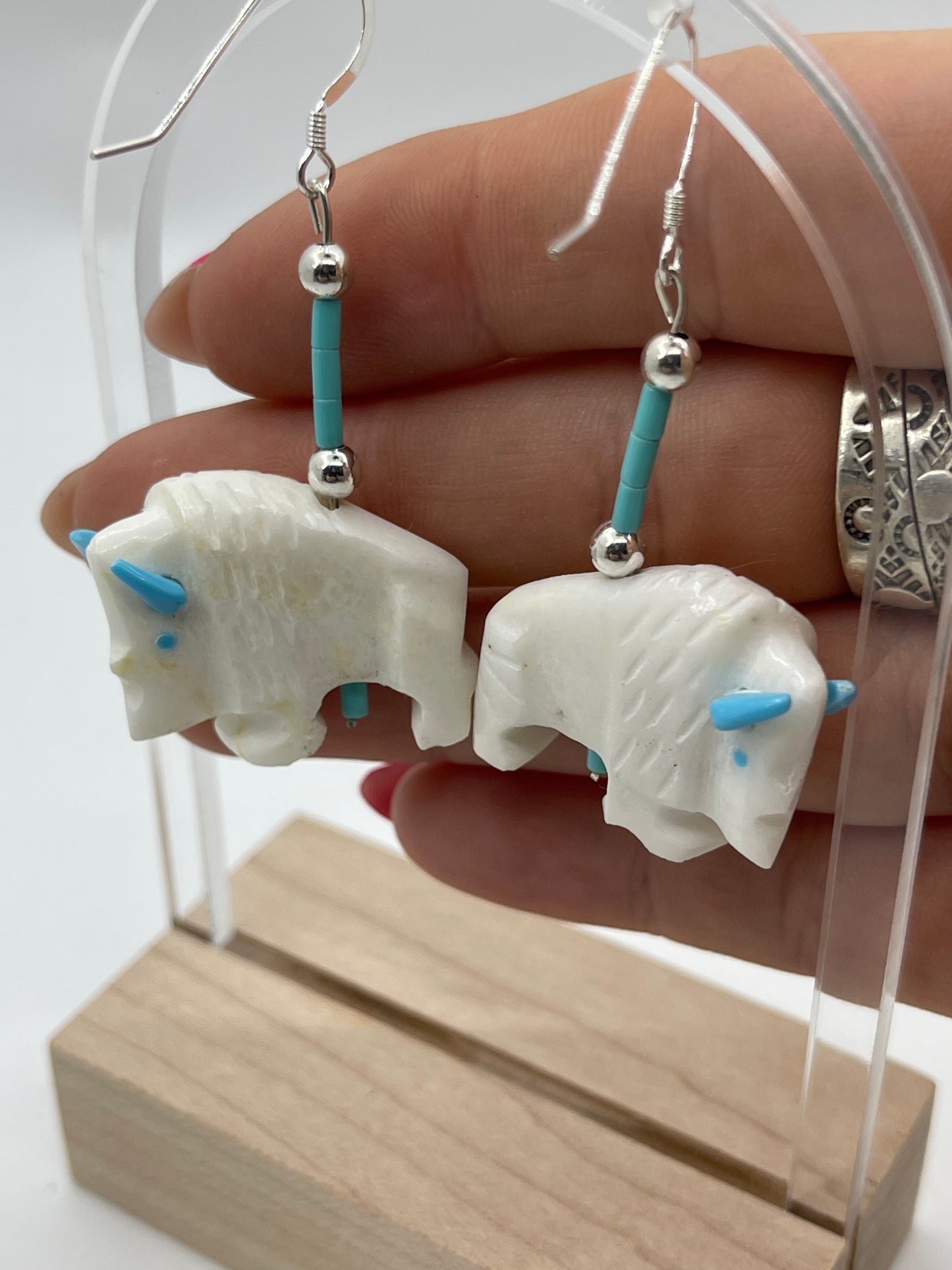 Carved Turquoise Buffalo Dangle Earrings by Todd Etsatie, Zuni