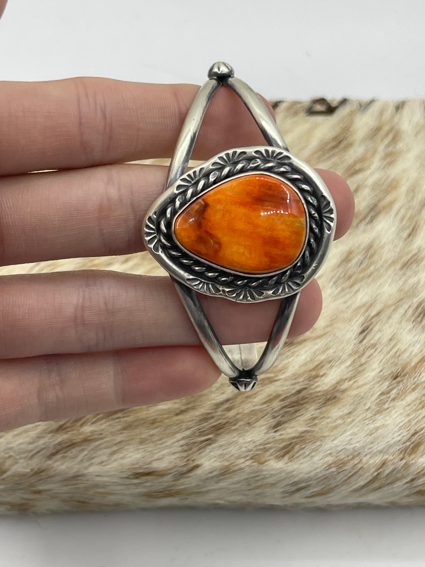 7 3/4"-7 1/4" Teardrop Orange Spiny Oyster Shell Cuff by Augustine Largo, Navajo
