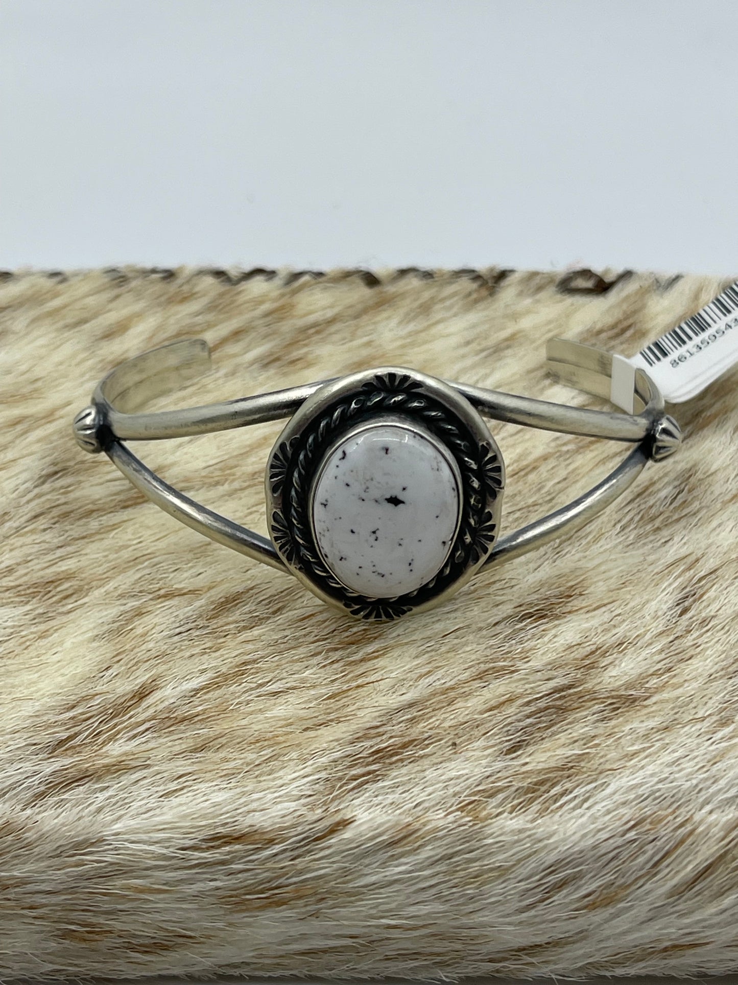 5 3/4"-7 1/4" White Buffalo Oval Cuff by Augustine Largo, Navajo