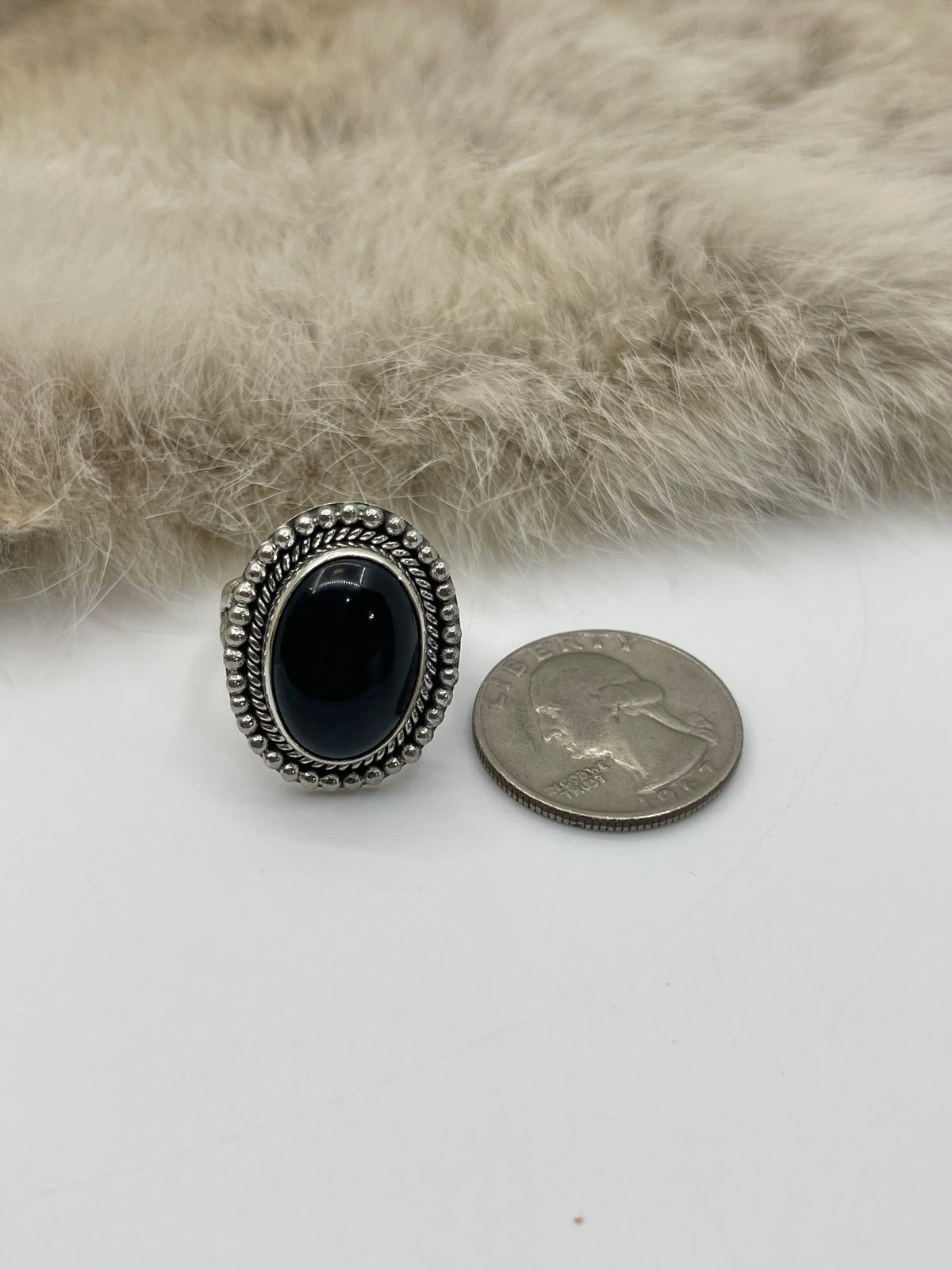 7.5 Black Onyx Oval Ring with Silver Border