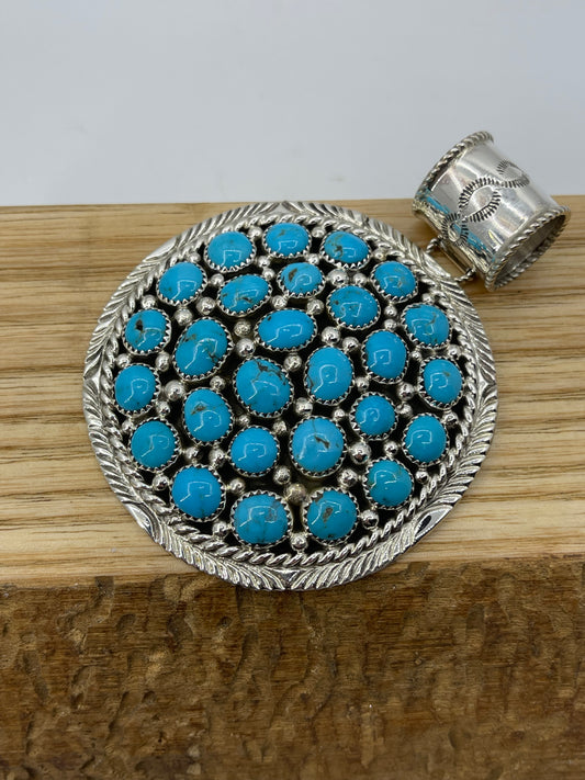 28 Stone Sleeping Beauty Turquoise Round Pendant by Marlene Jones, Navajo