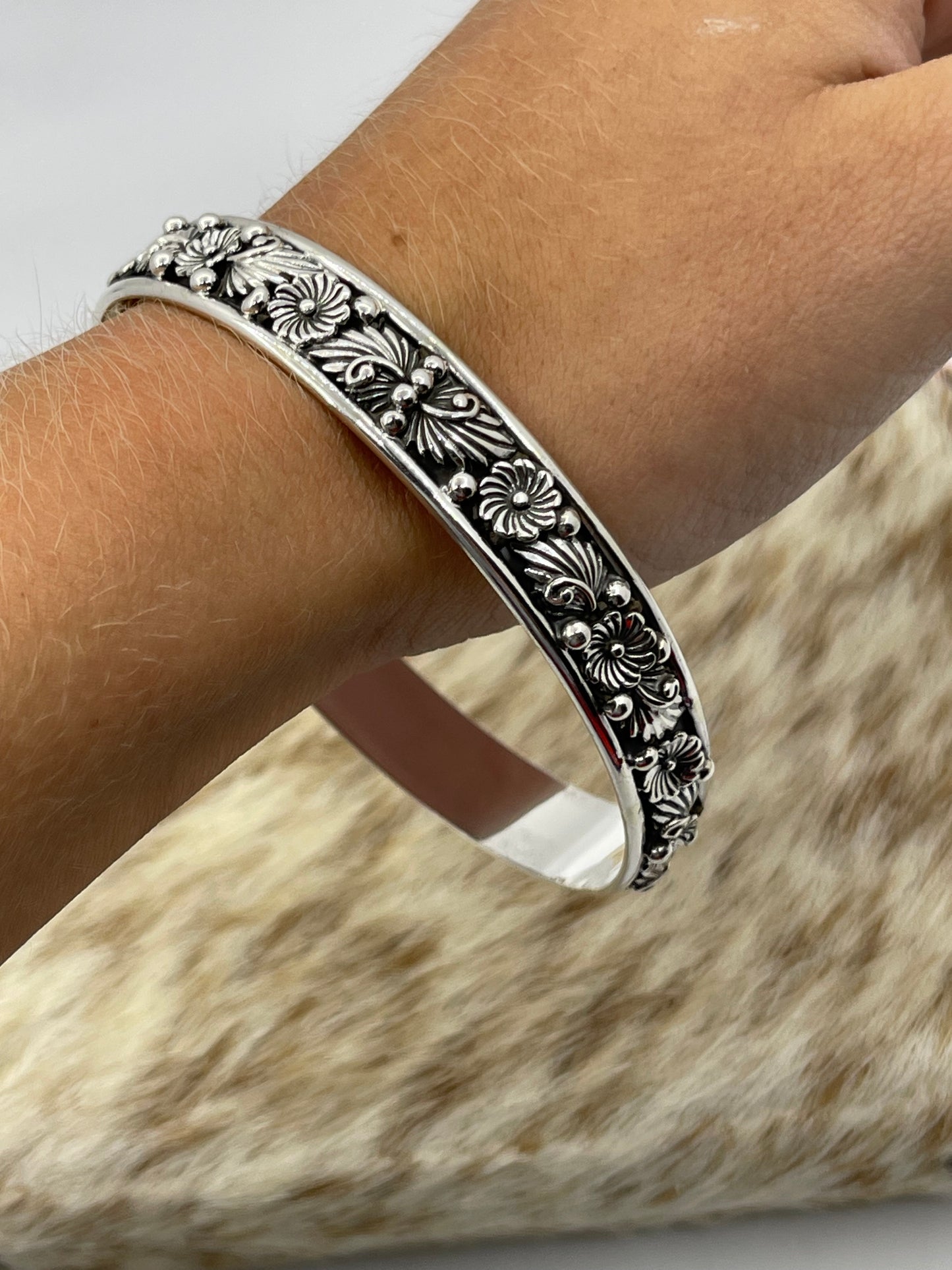 8 1/4" Silver Floral Bangle by Sadie Jim, Navajo