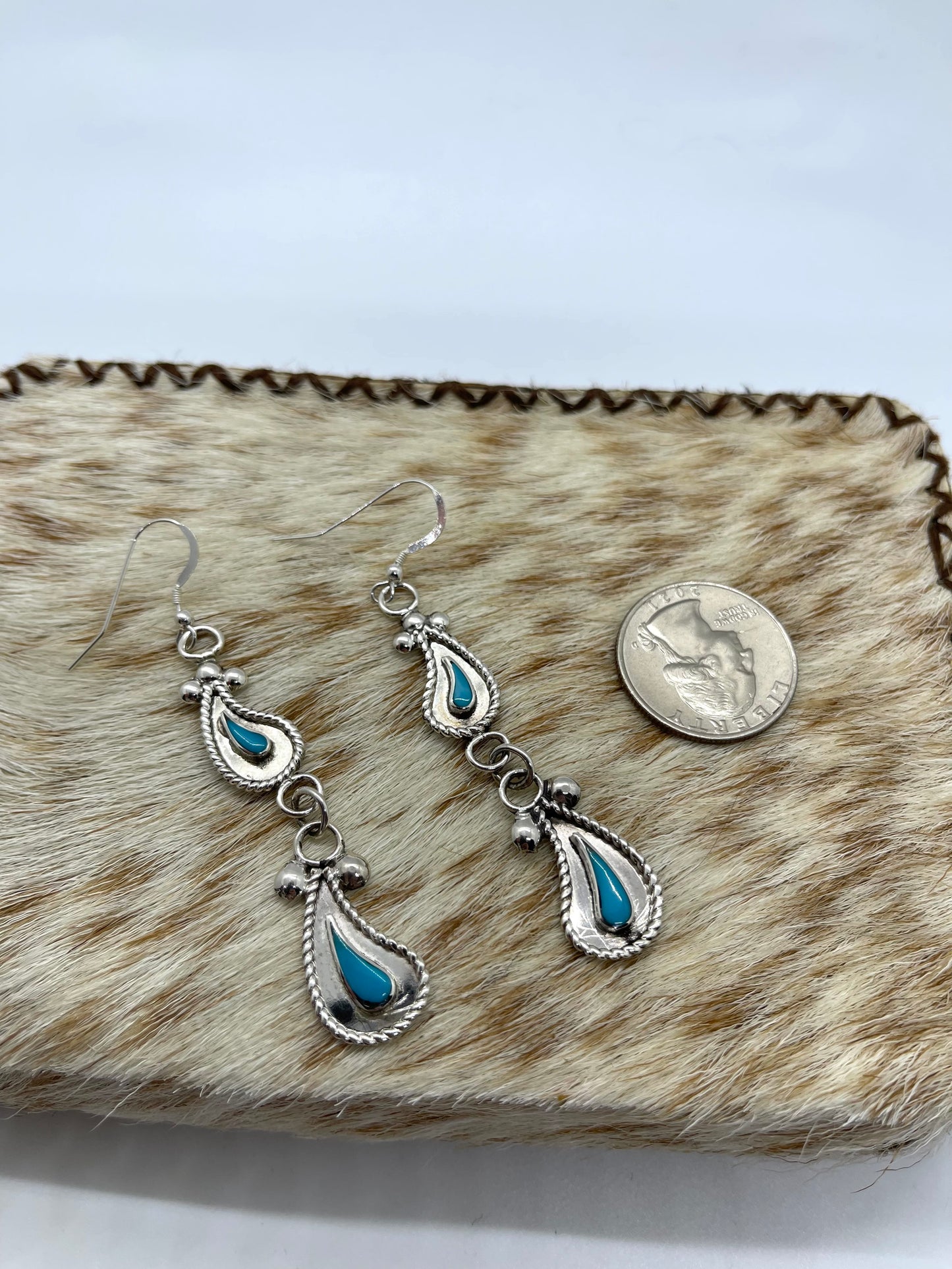 Turquoise and Silver Paisley Dangle Earrings by Gilbert Weebothee, Zuni