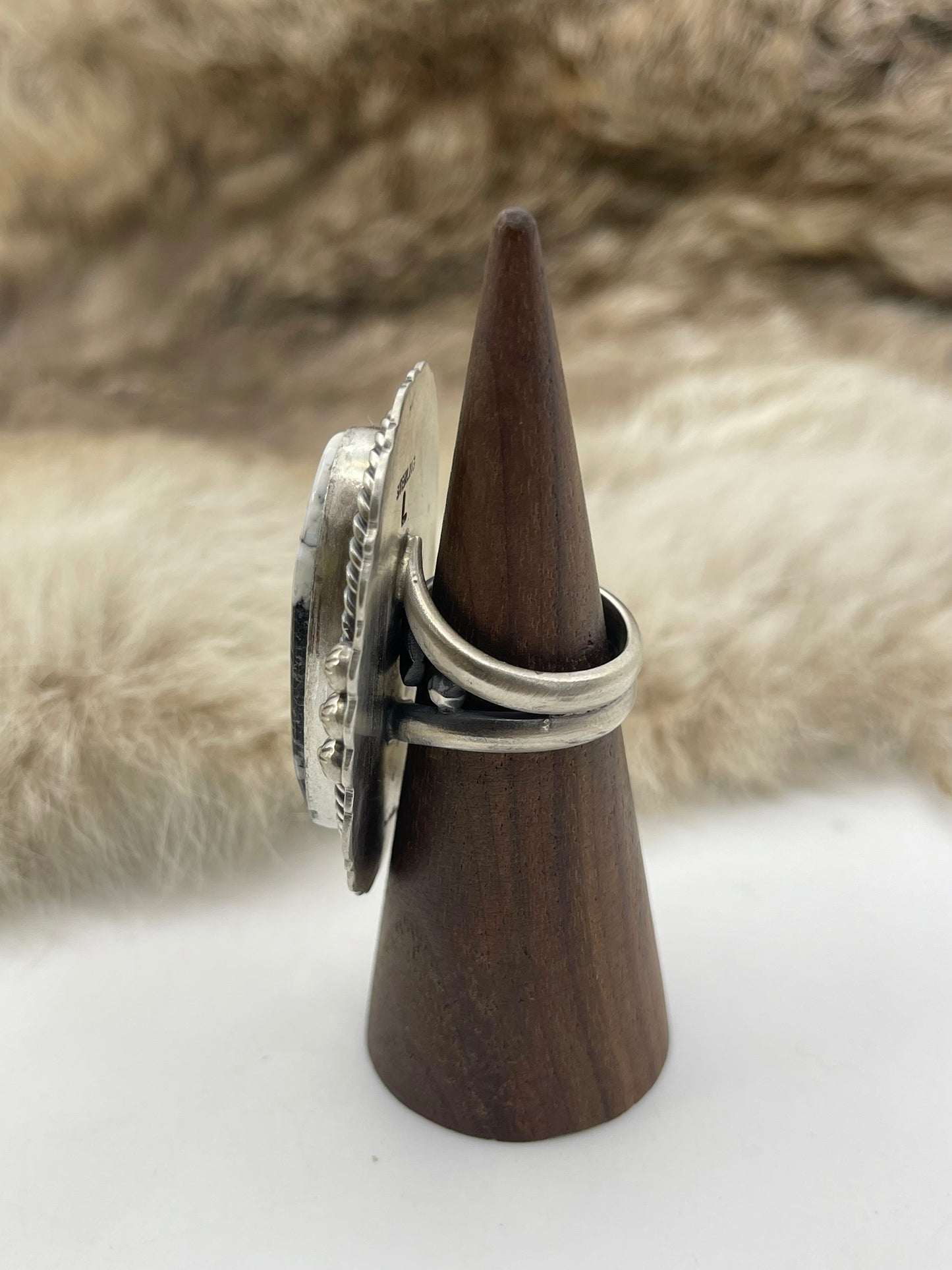 Adjustable 7.0-10.0 White Buffalo Ring with Stamped "L" by Artist